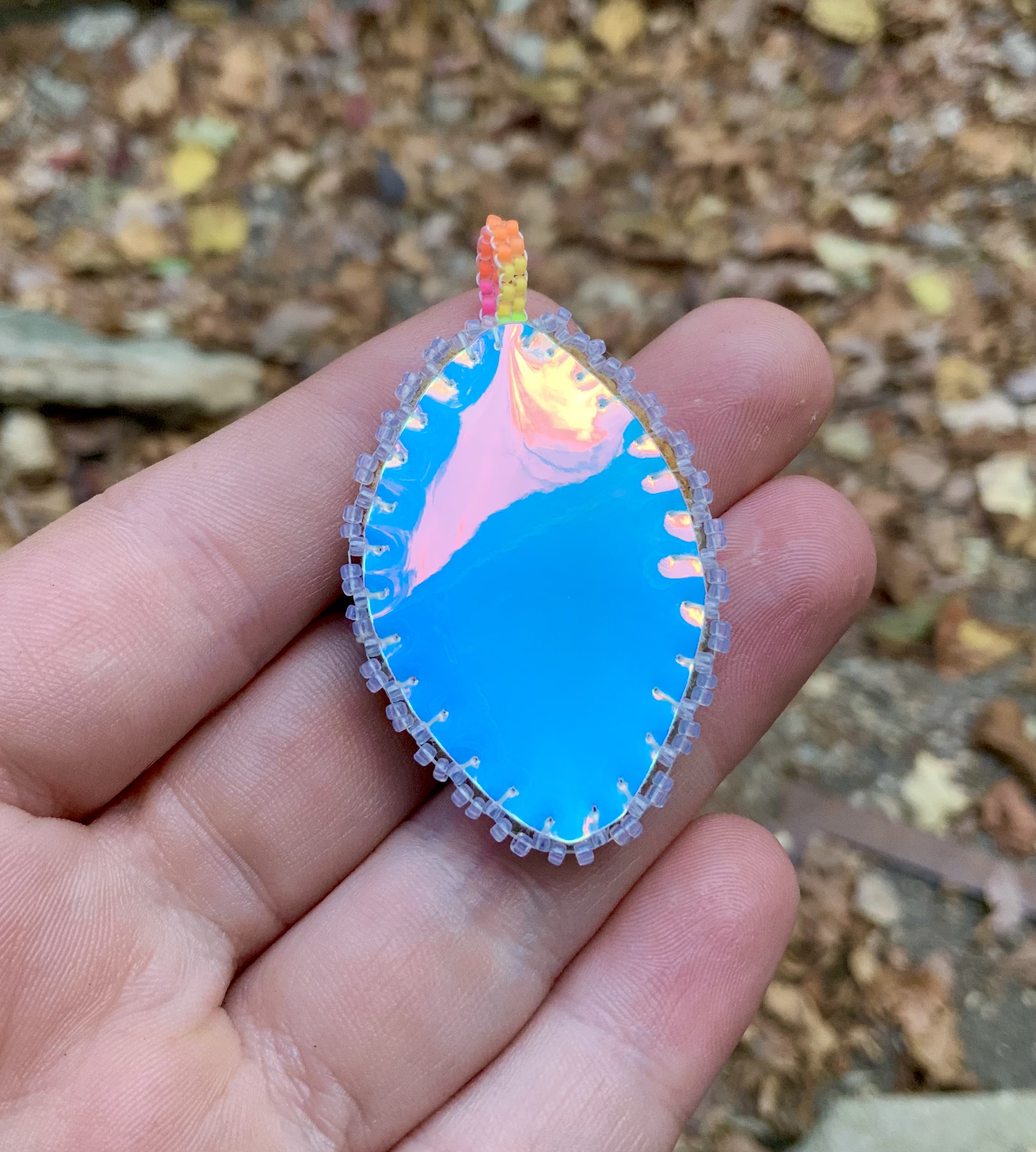 Glow in the dark and blacklight reactive opal and sunstone beaded amulet