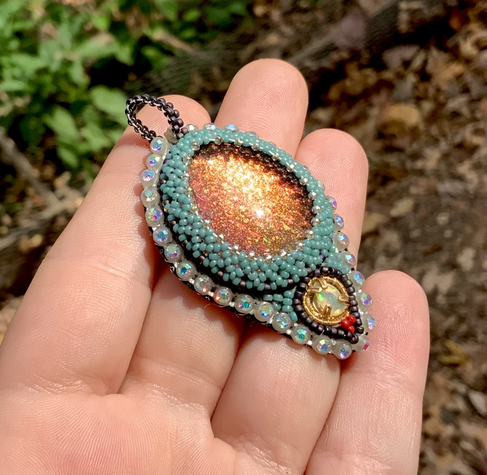 Fire sage glow in the dark beaded amulet with opal