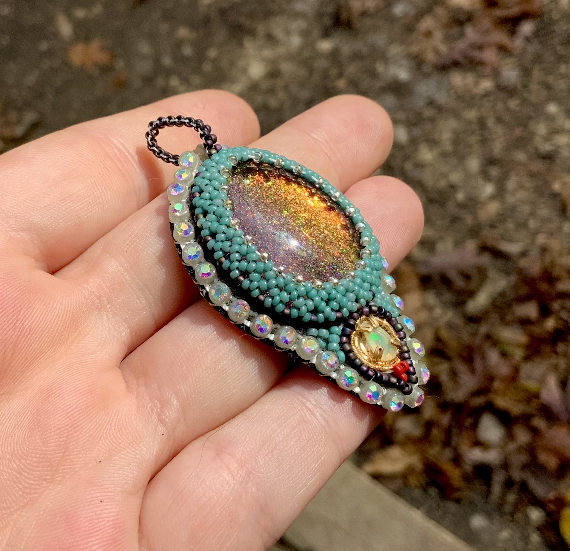 Fire sage glow in the dark beaded amulet with opal