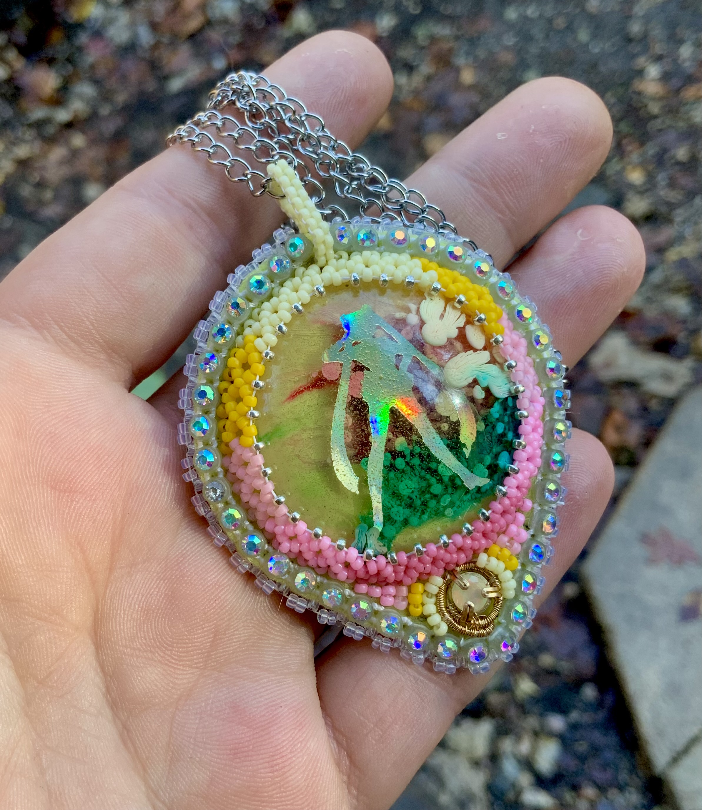 Beaded glow in the dark and blacklight reactive sailor moon amulet