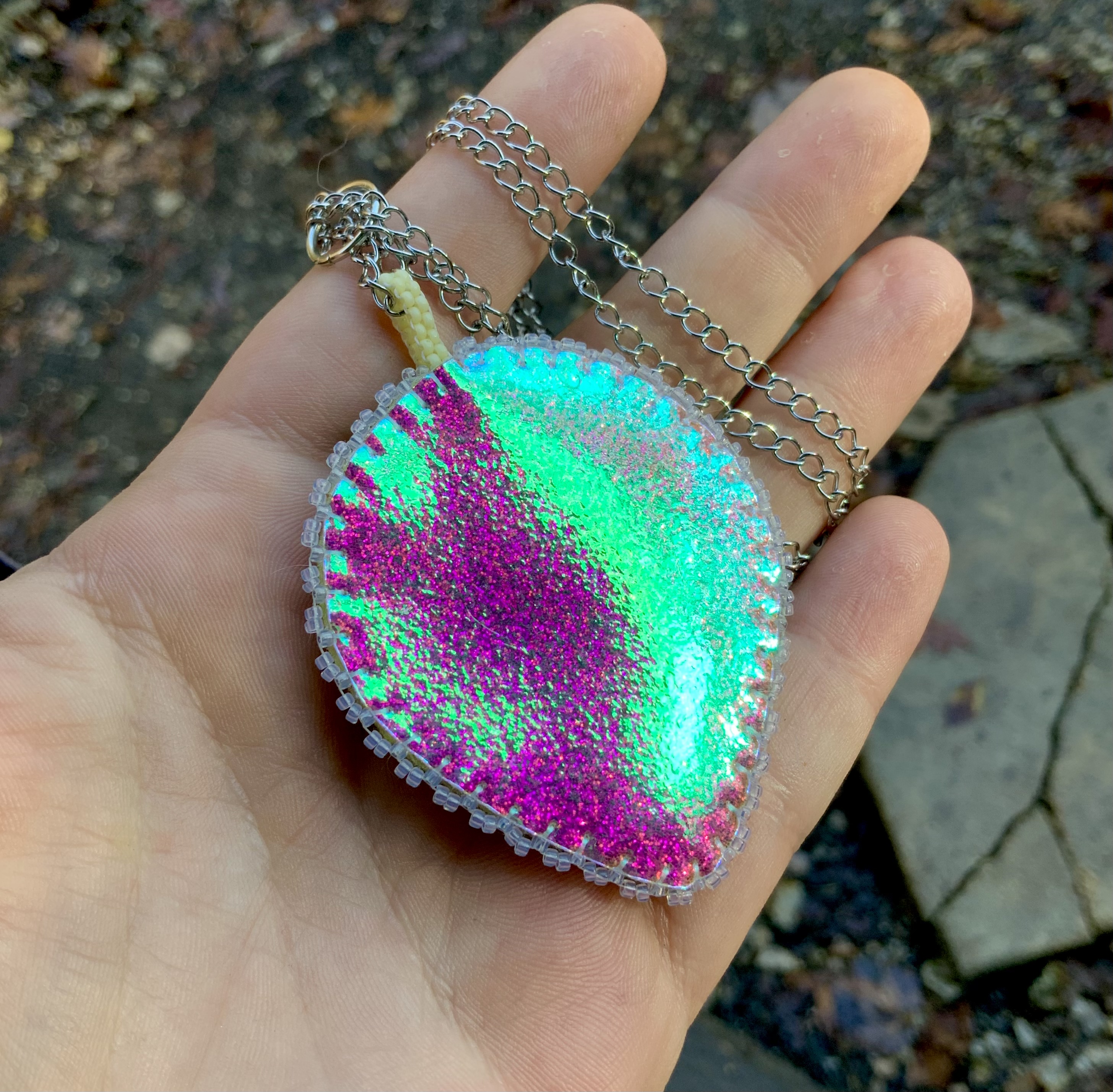 Beaded glow in the dark and blacklight reactive sailor moon amulet