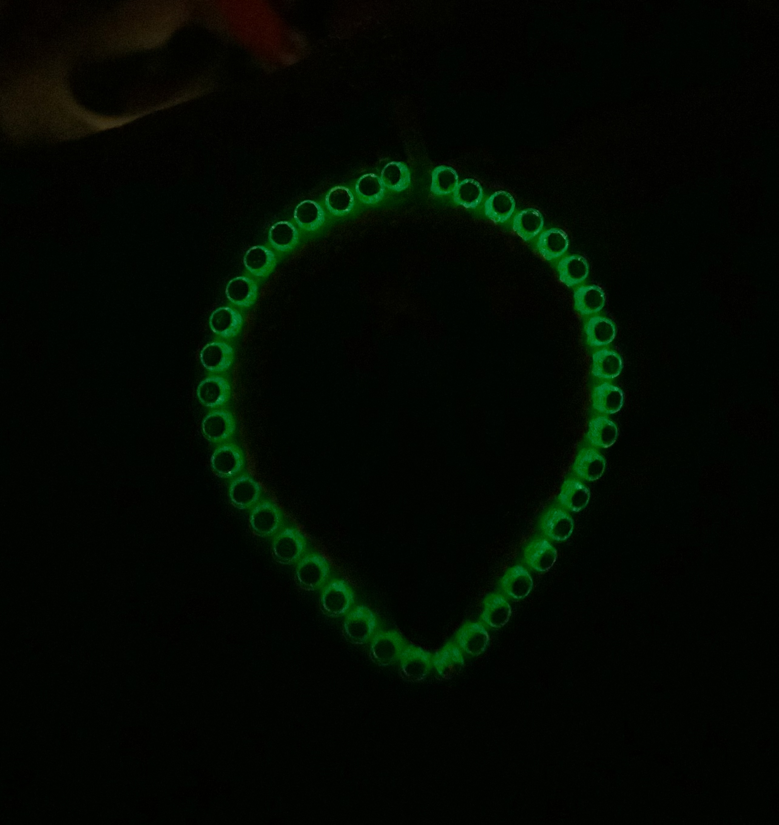 Beaded glow in the dark and blacklight reactive sailor moon amulet
