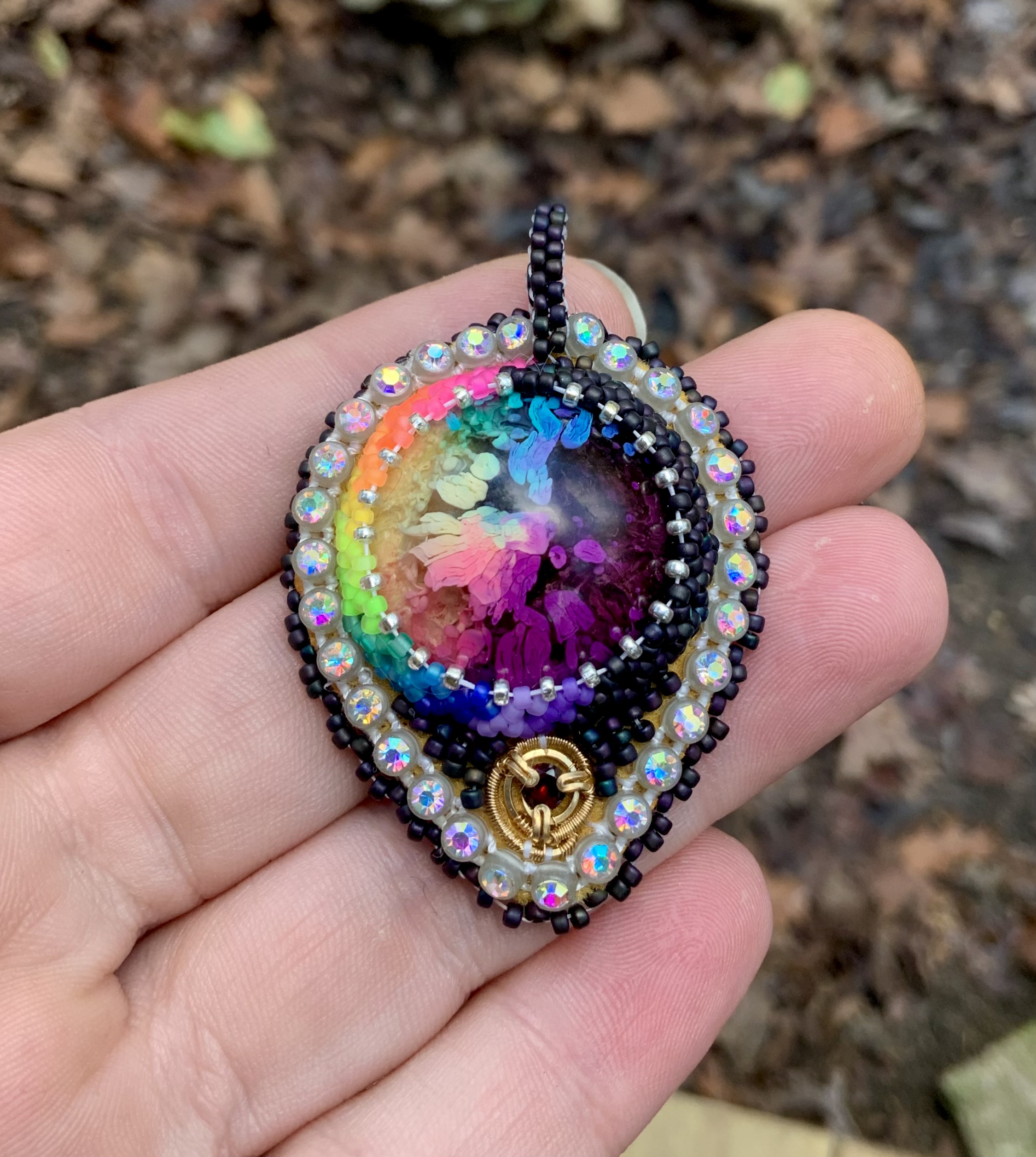 Rainbow blastard beaded amulet