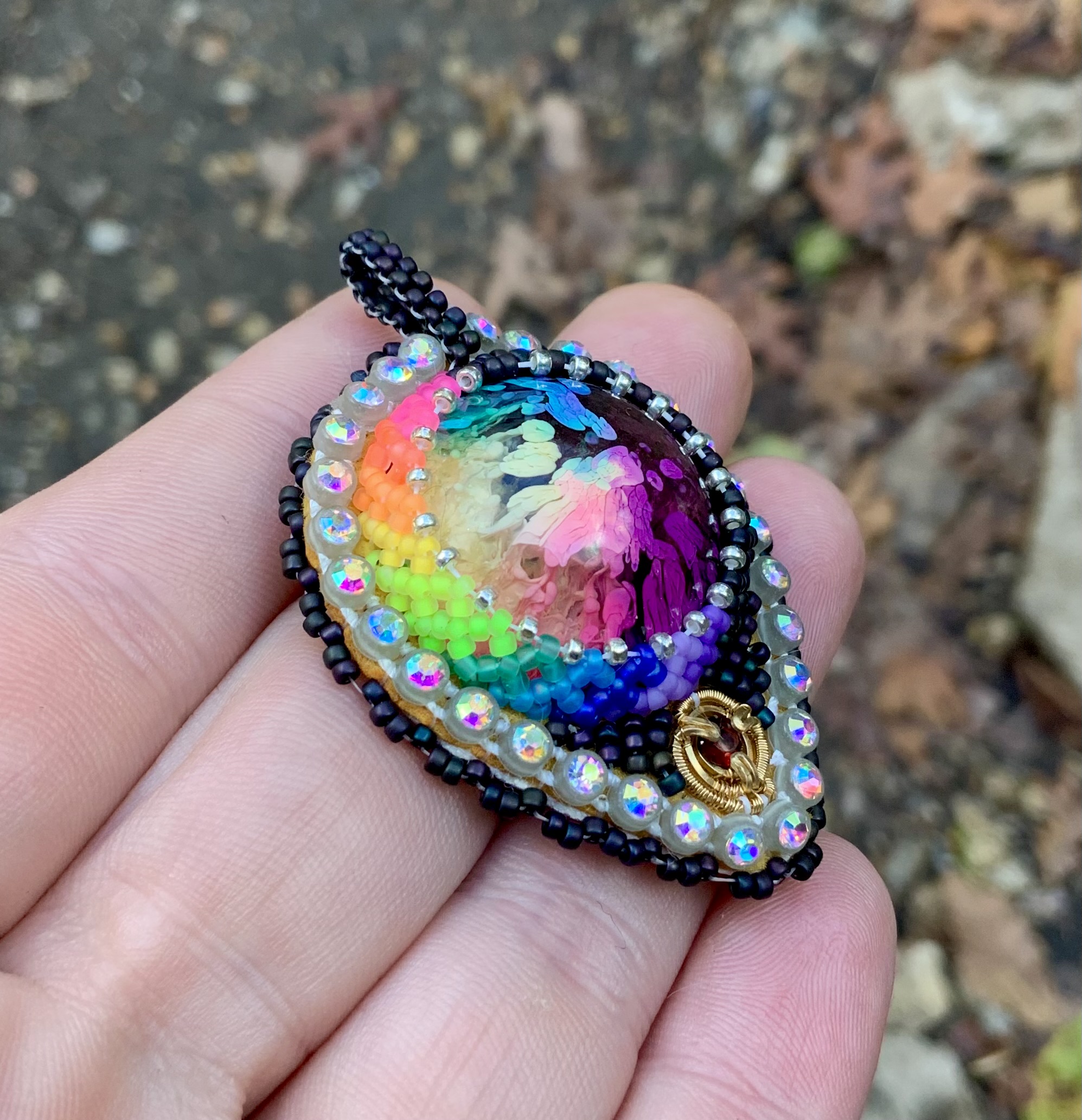 Rainbow blastard beaded amulet