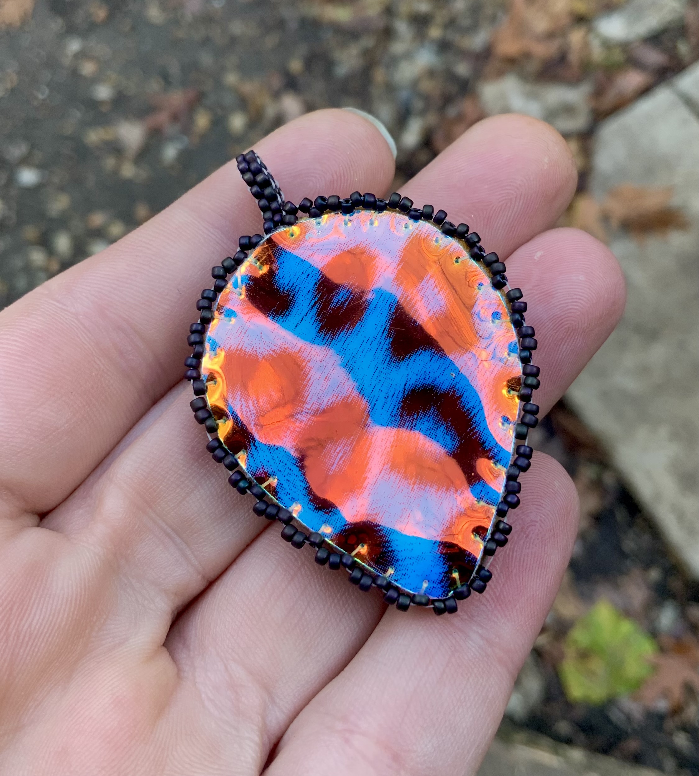 Rainbow blastard beaded amulet
