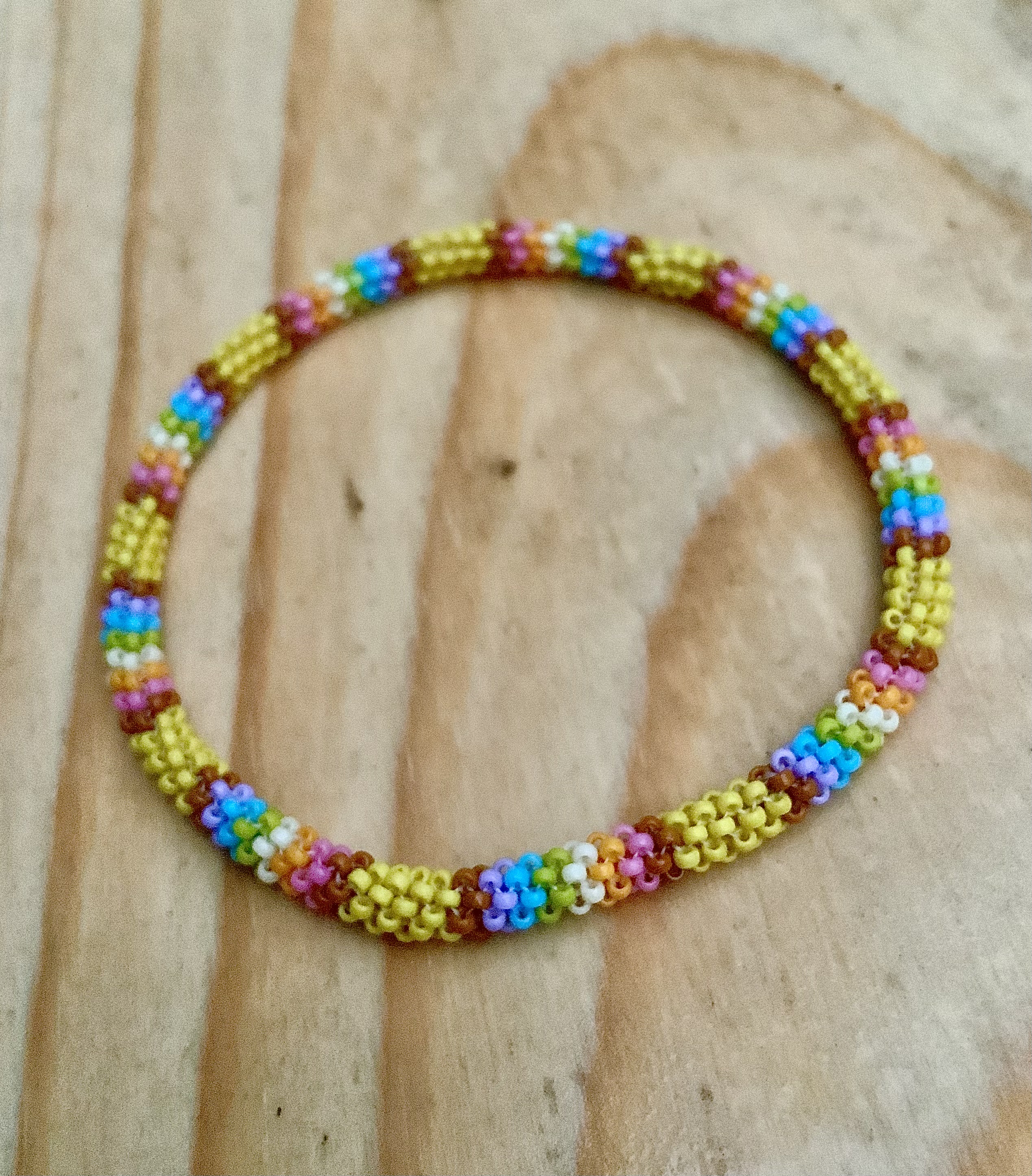 Pastel rainbow gourd stitched roll on bracelet