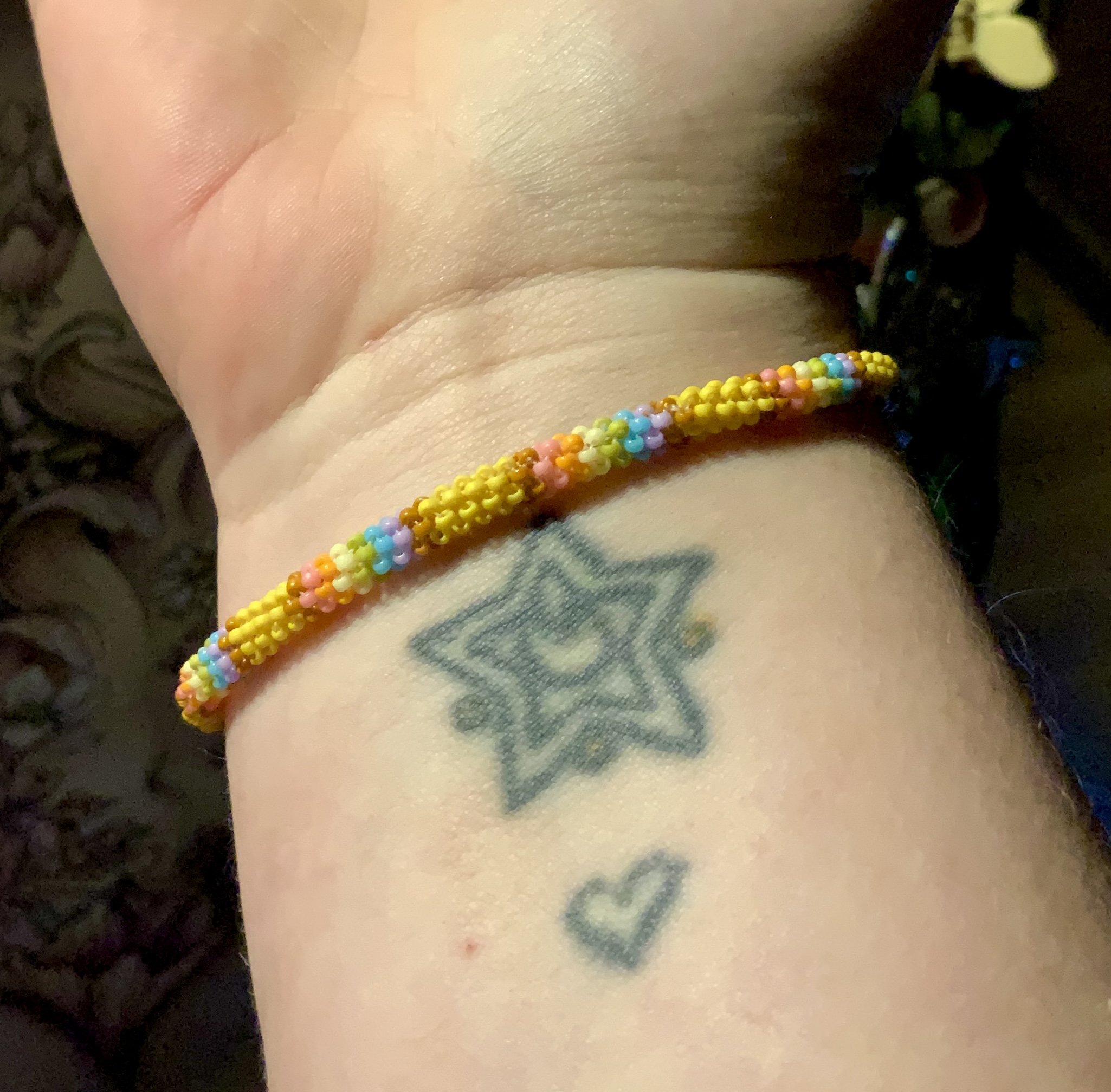Pastel rainbow gourd stitched roll on bracelet