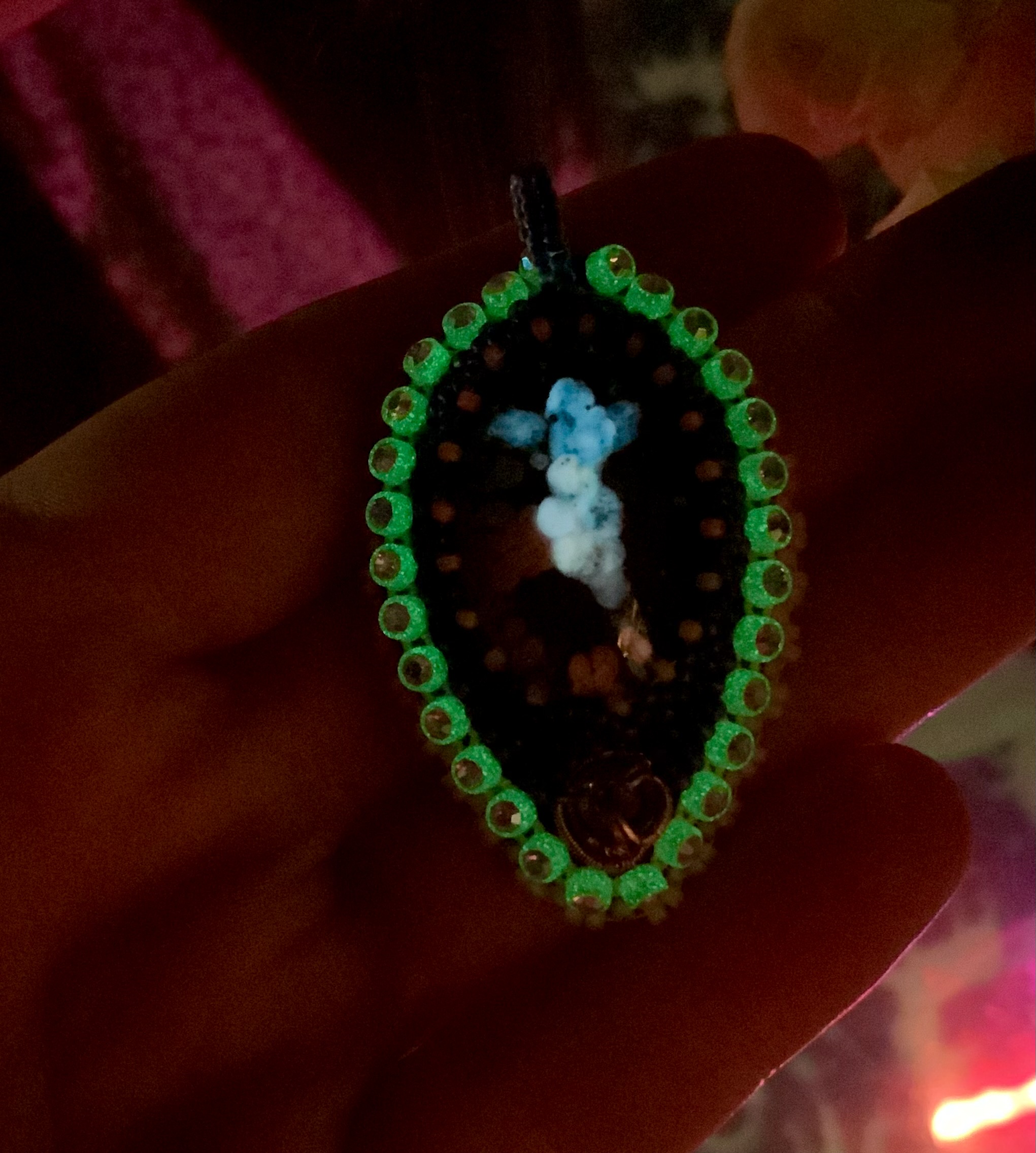 Blacklight reactive glow in the dark blue hue beaded pendant