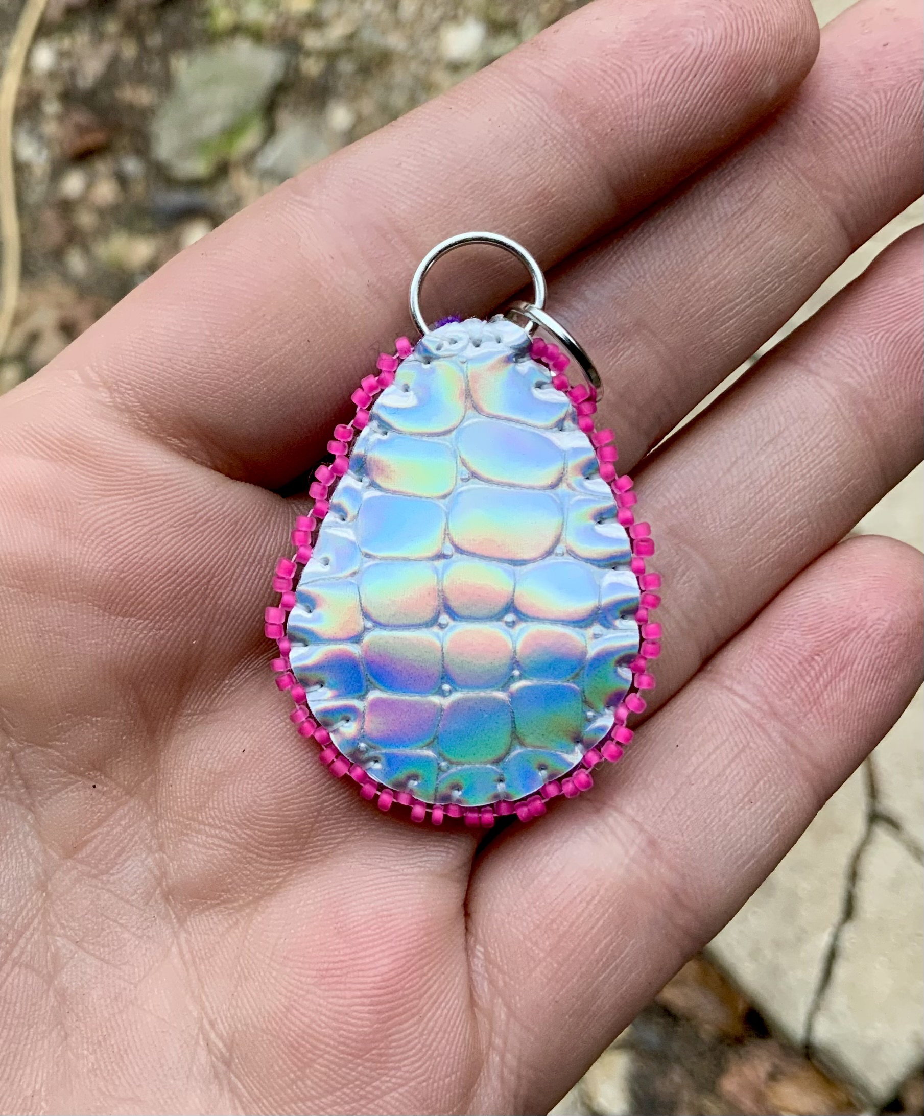 Dark rainbow beaded pendant with topaz 