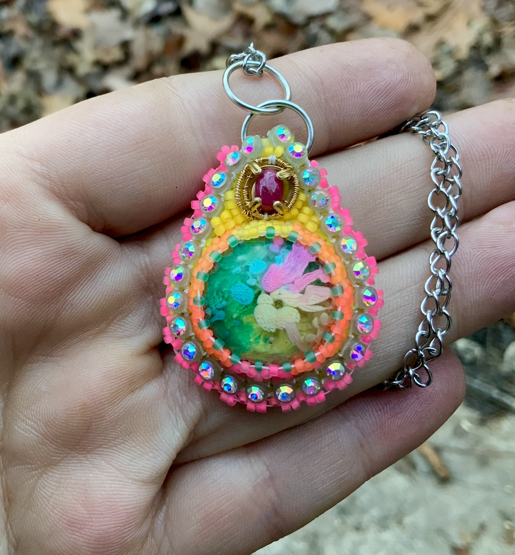 Pink fire beaded pendant with ruby