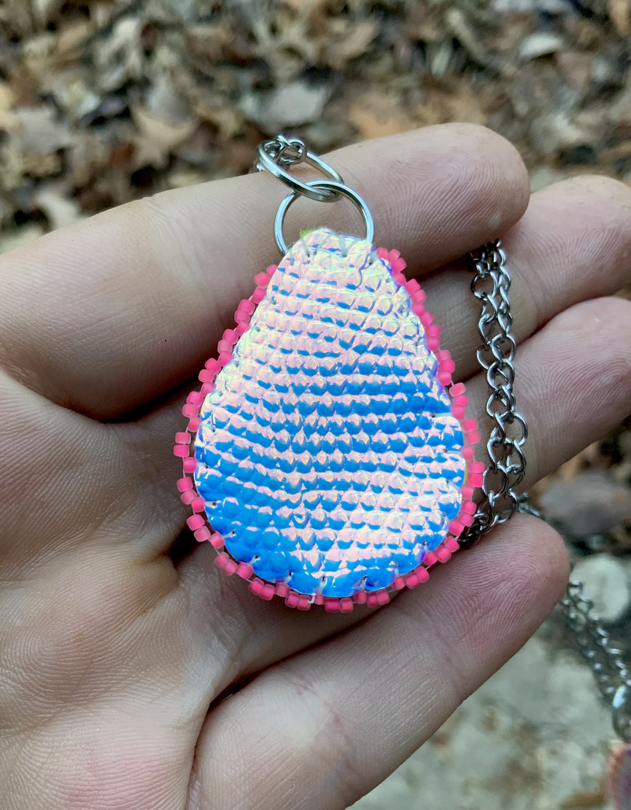 Pink fire beaded pendant with ruby