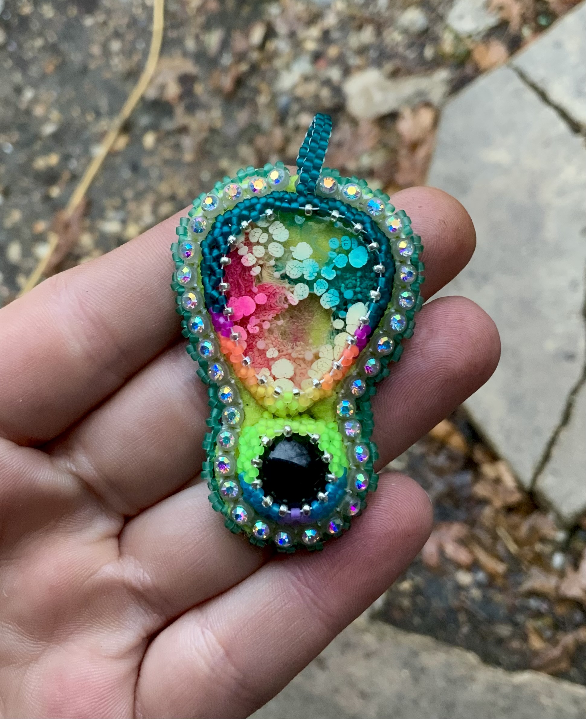 Deep teal and neon rainbow beaded pendant 