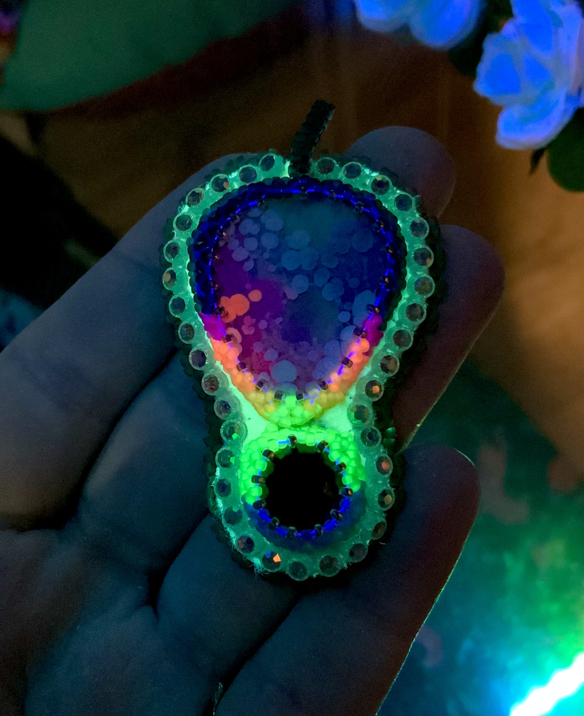 Deep teal and neon rainbow beaded pendant 