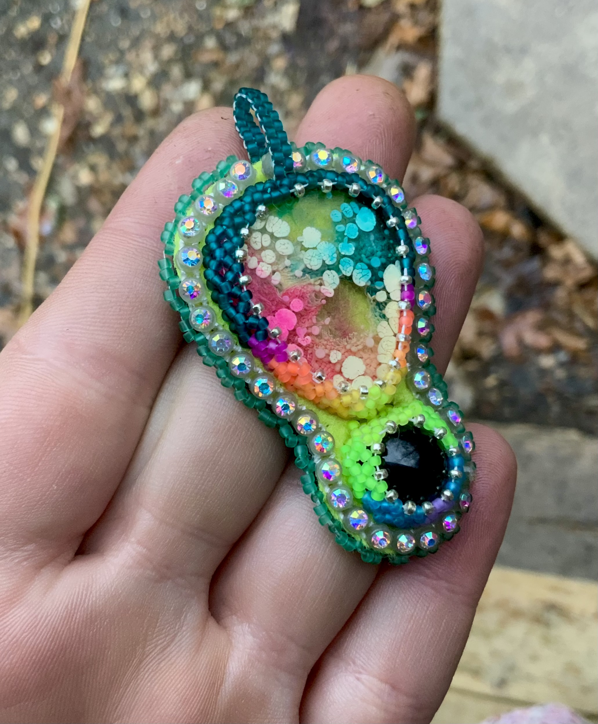 Deep teal and neon rainbow beaded pendant 