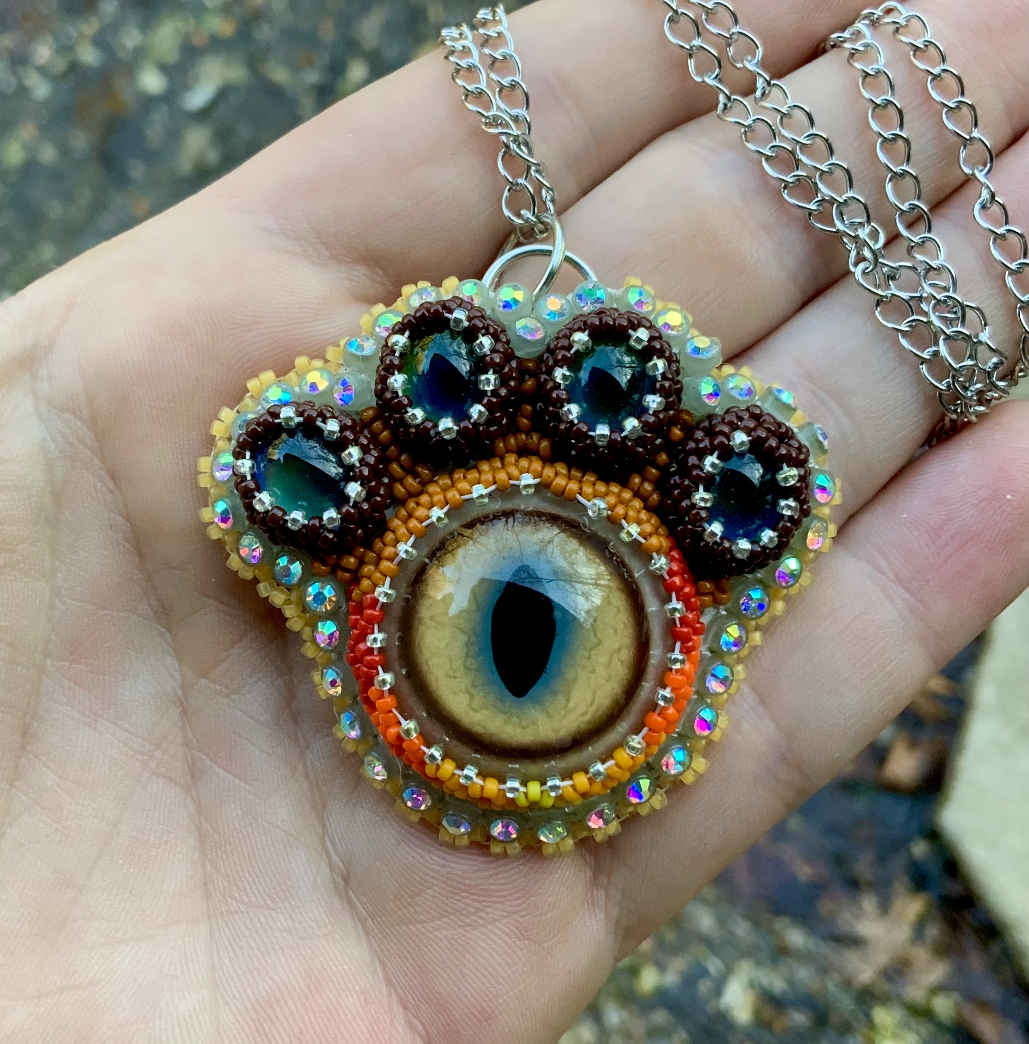 Puma paw beaded pendant with thermal color change