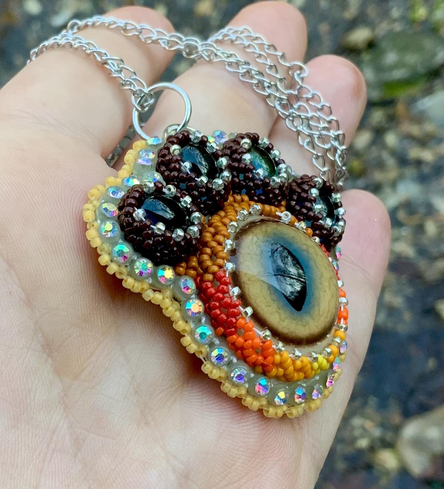 Puma paw beaded pendant with thermal color change
