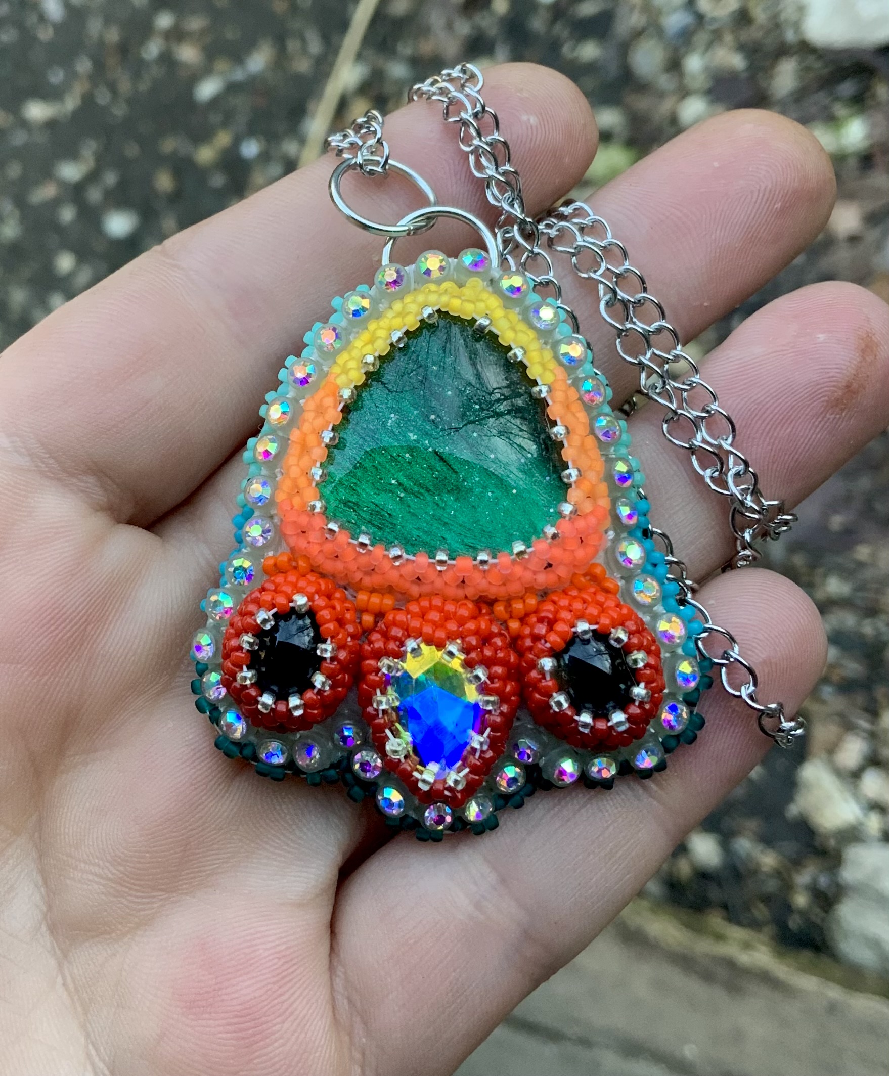 Teal phoenix beaded pendant