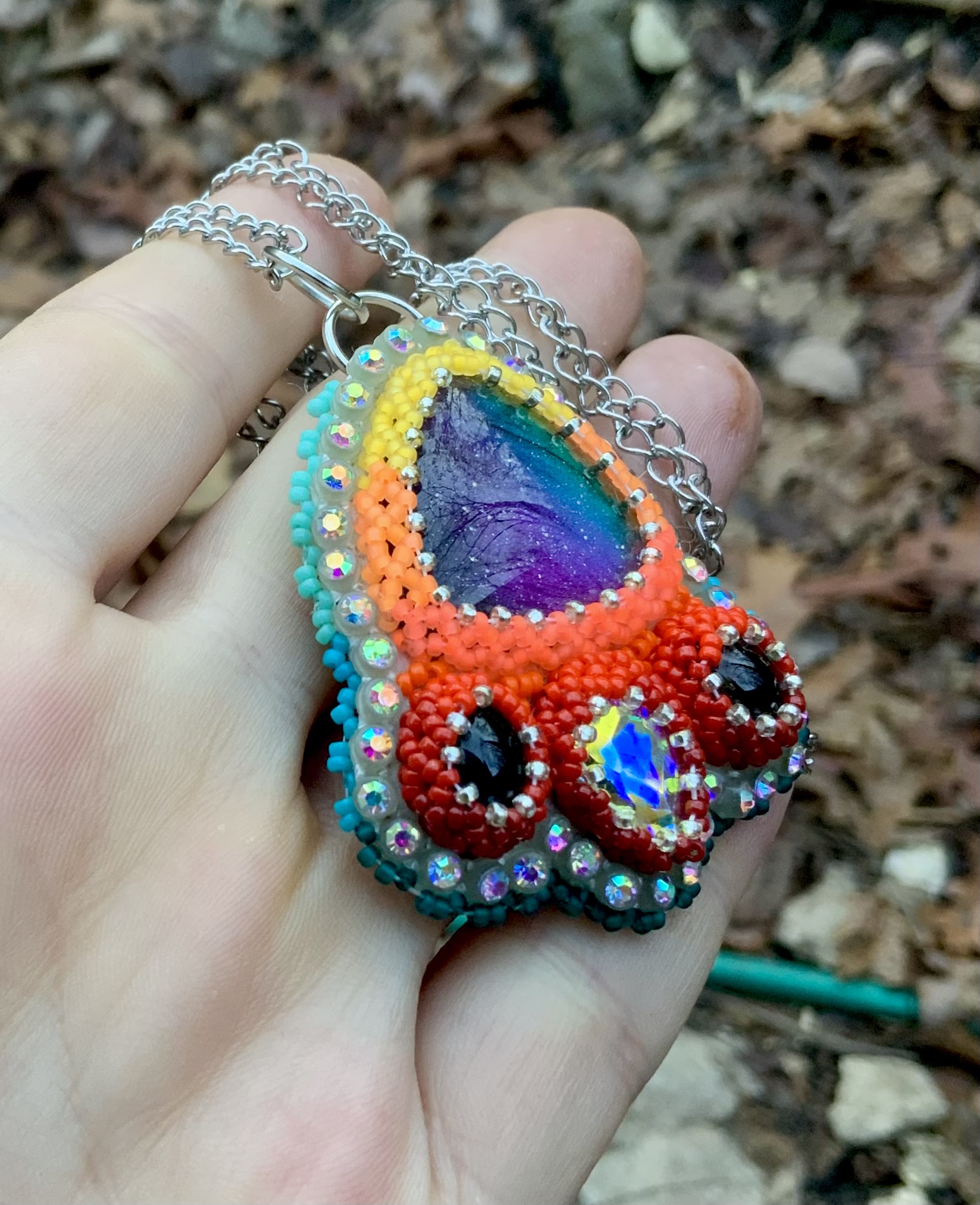 Teal phoenix beaded pendant