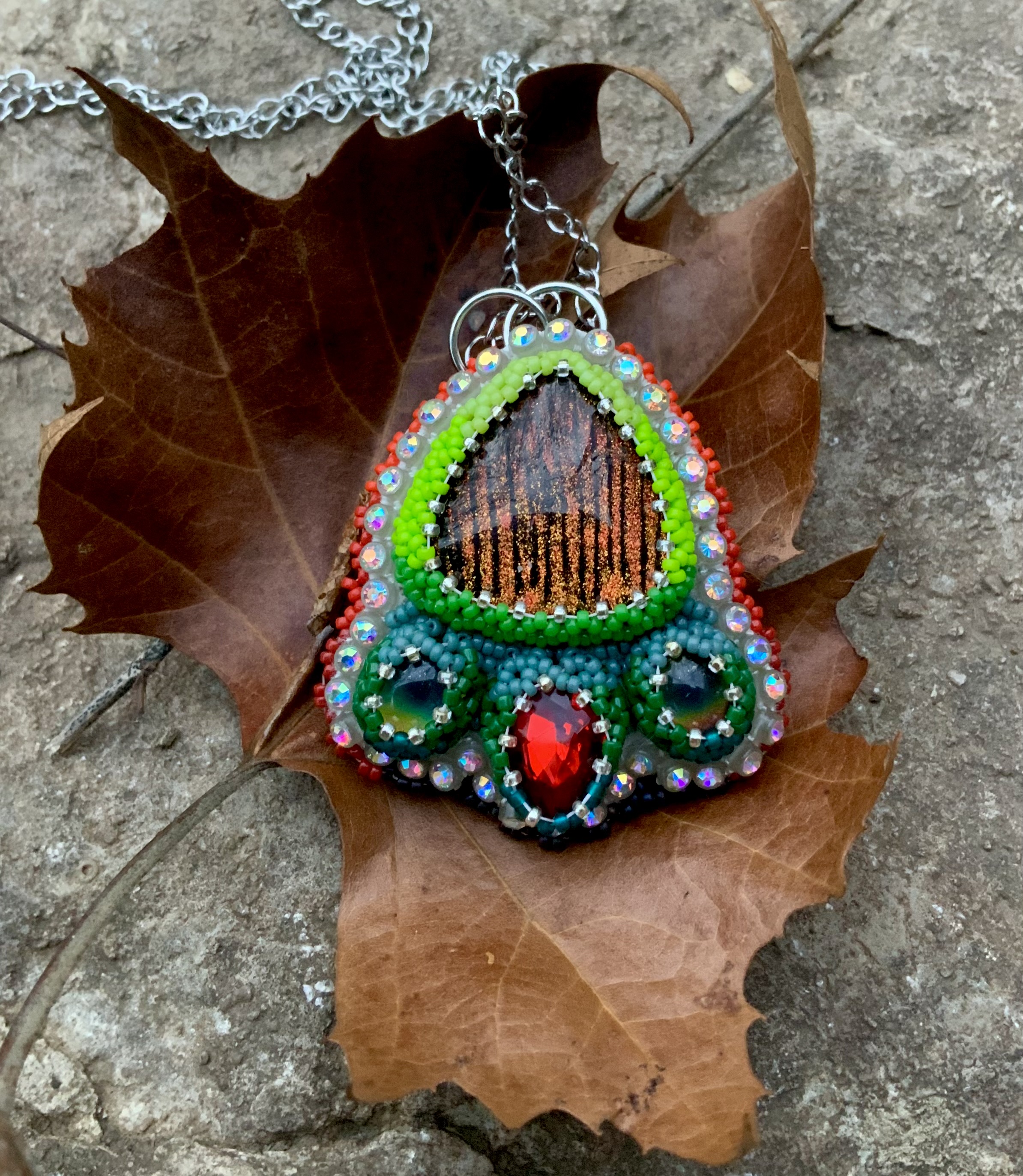 Tiger in the grass beaded pendant