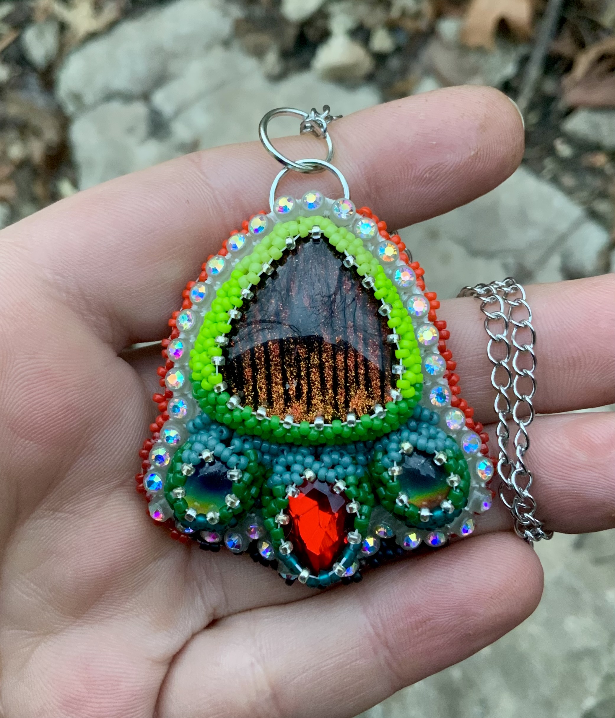 Tiger in the grass beaded pendant
