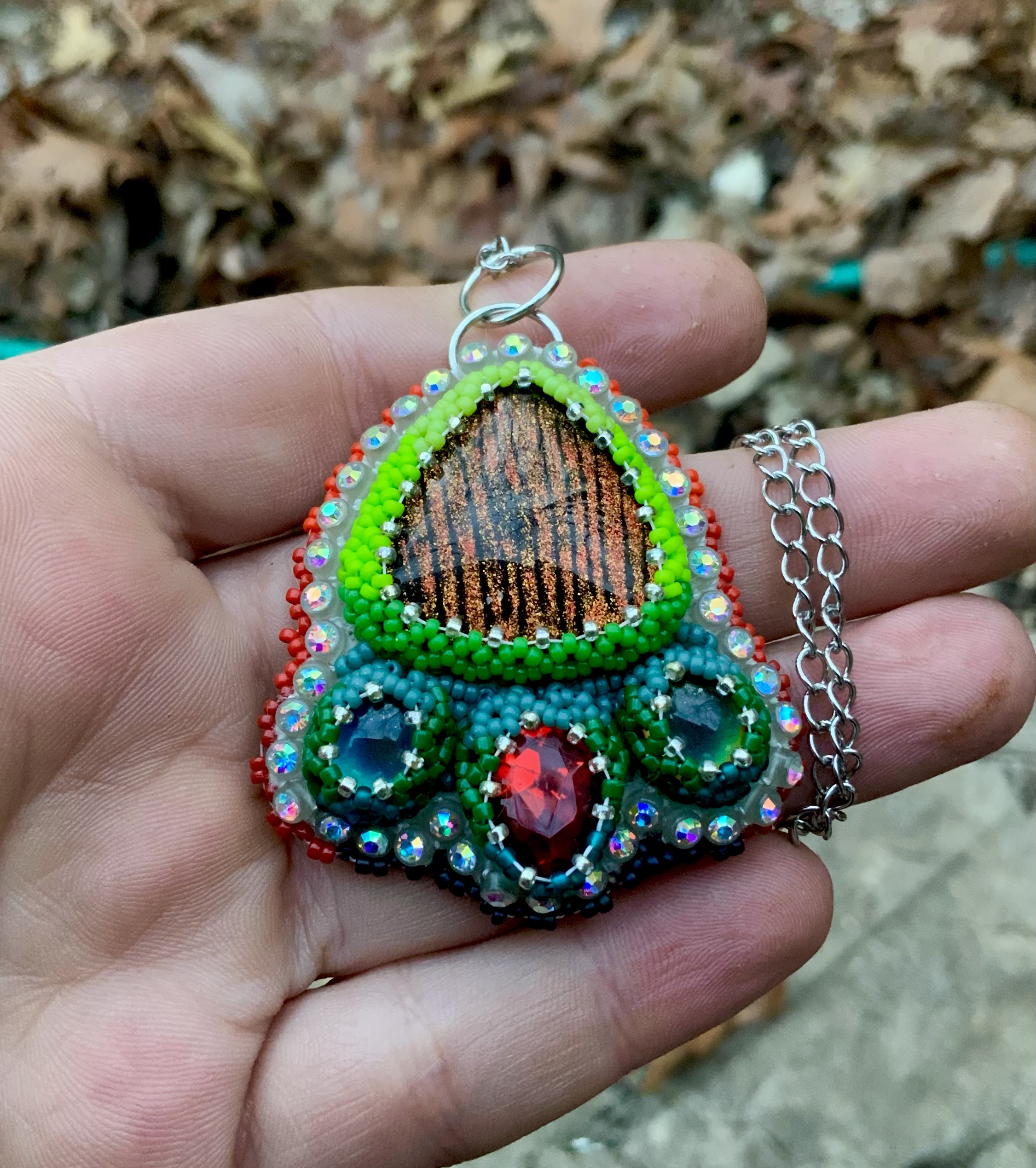 Tiger in the grass beaded pendant