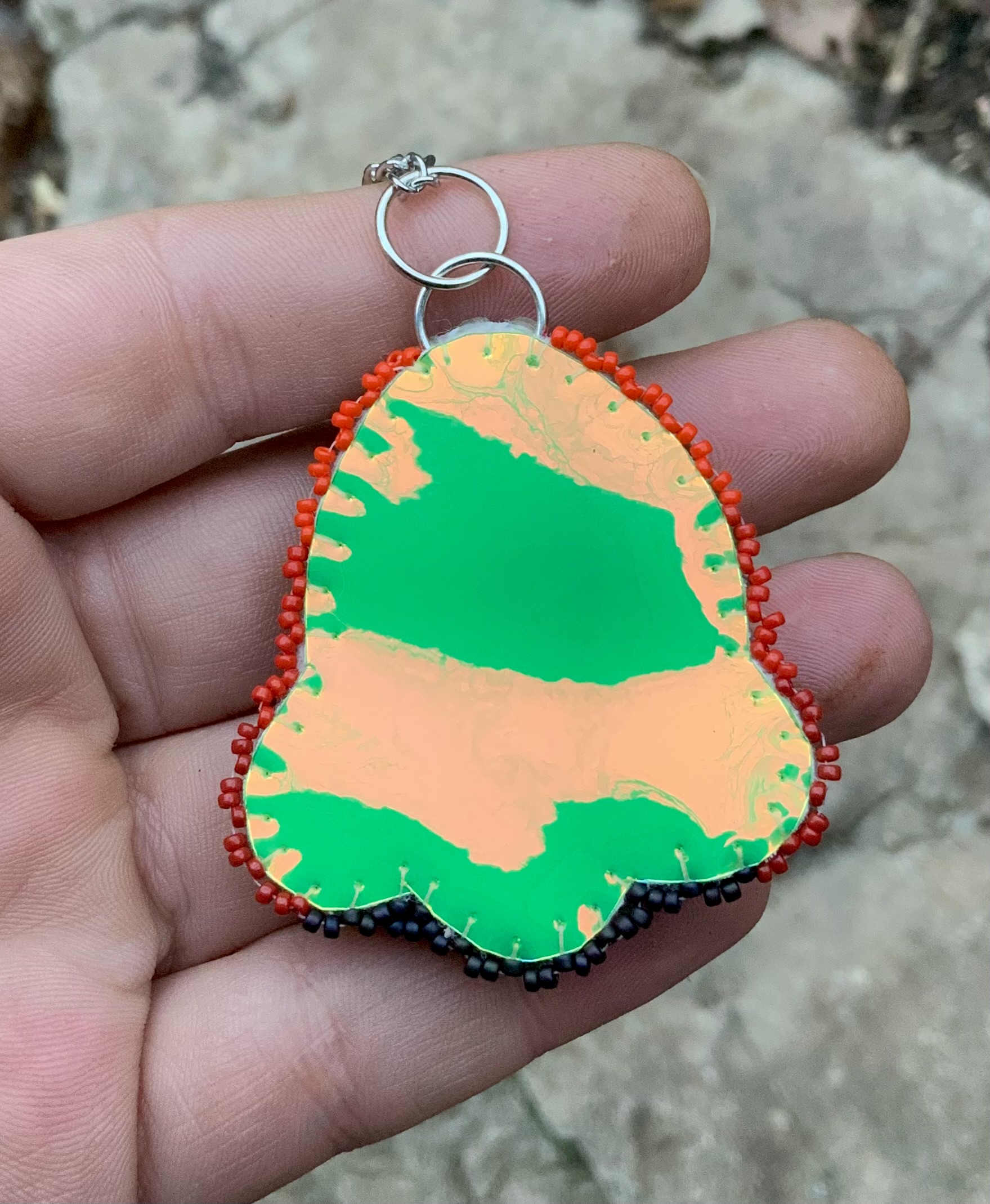 Tiger in the grass beaded pendant