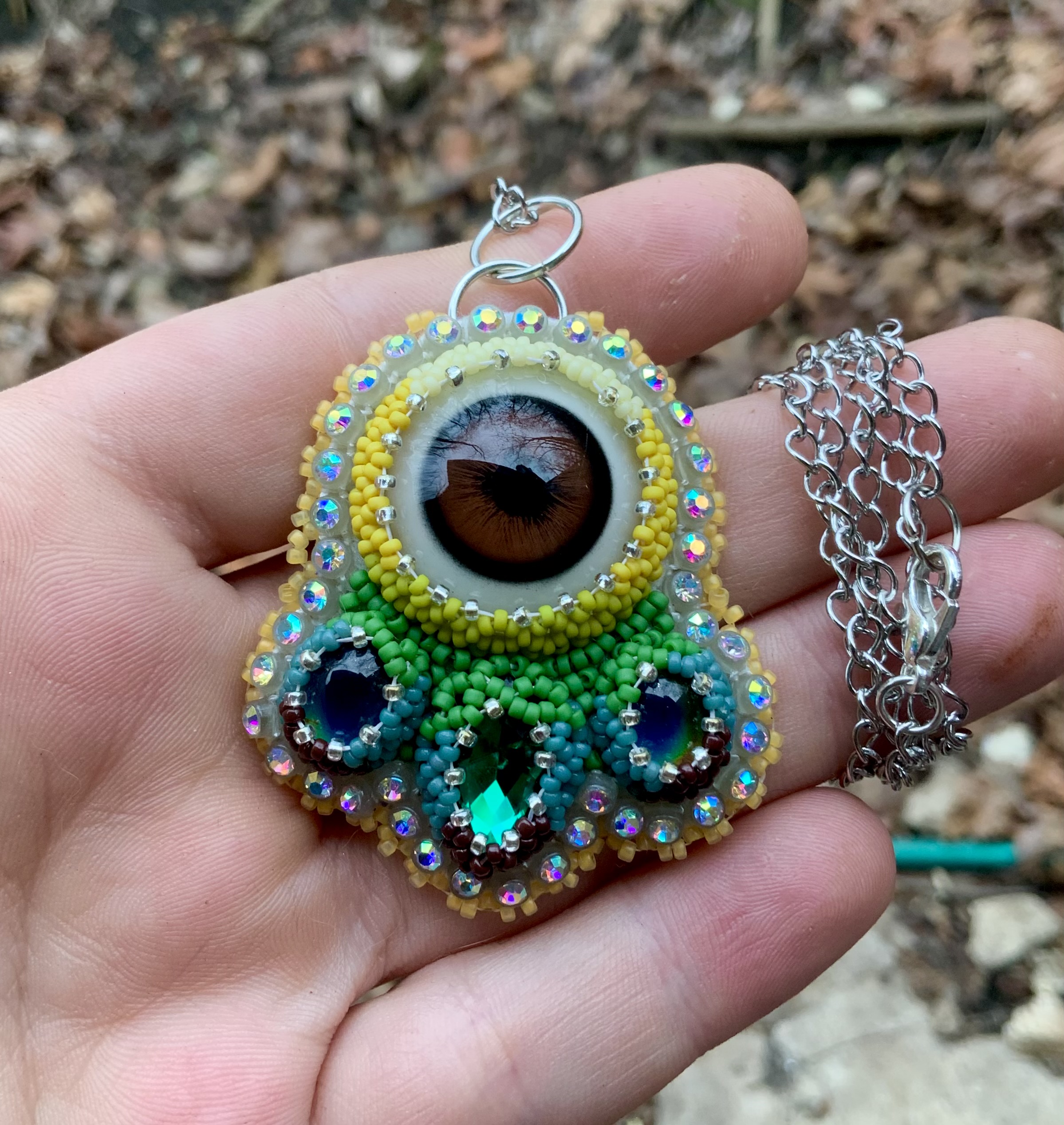 Sunflower puma eye beaded pendant