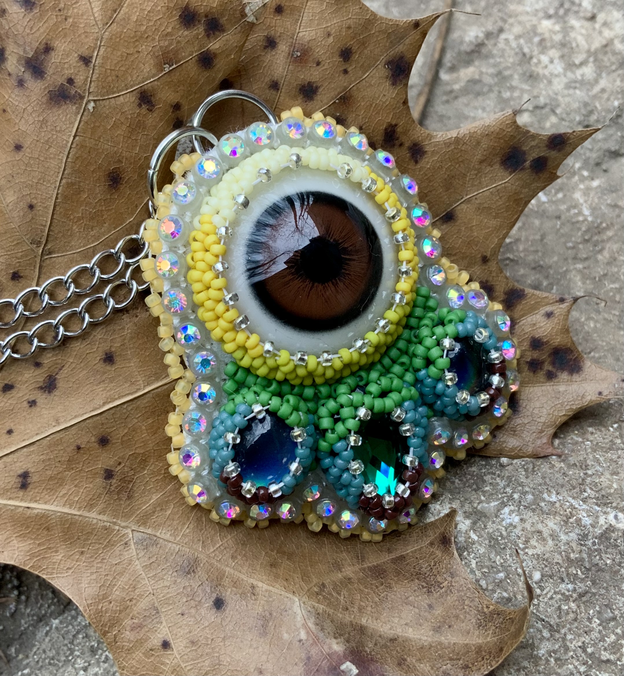Sunflower puma eye beaded pendant