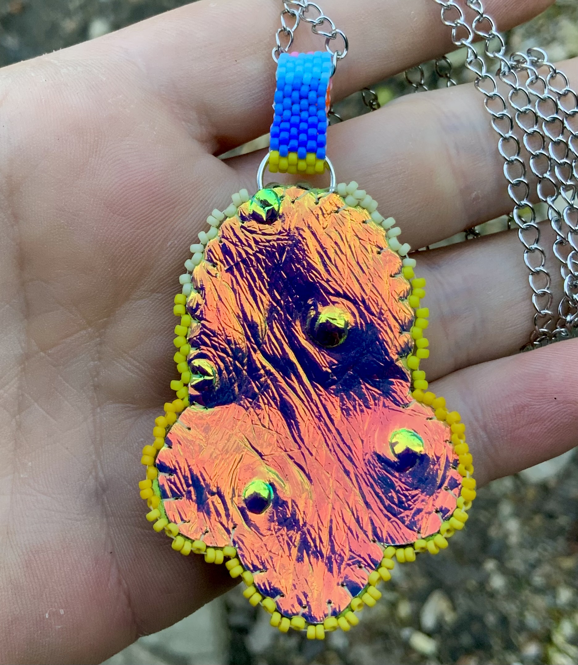 Rainbow gourd stitched color changey beaded spaceship pendant