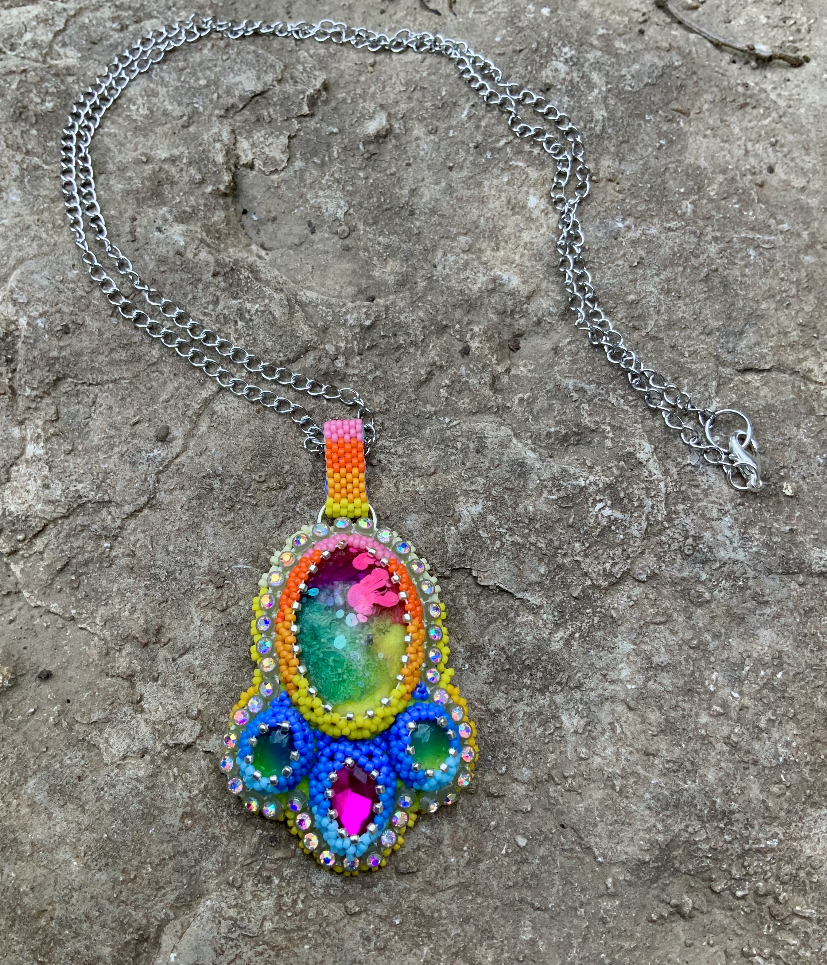 Rainbow gourd stitched color changey beaded spaceship pendant