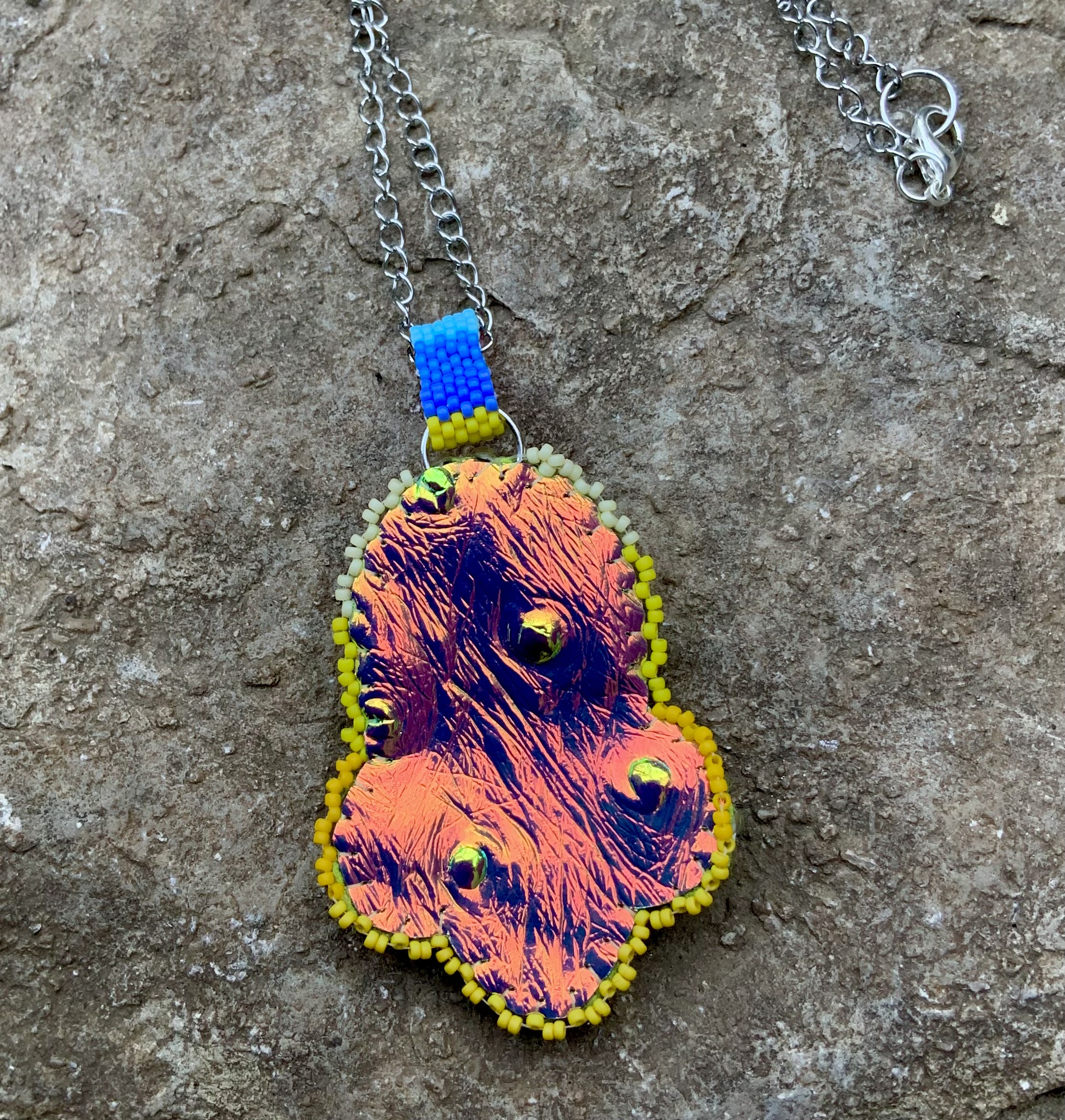 Rainbow gourd stitched color changey beaded spaceship pendant