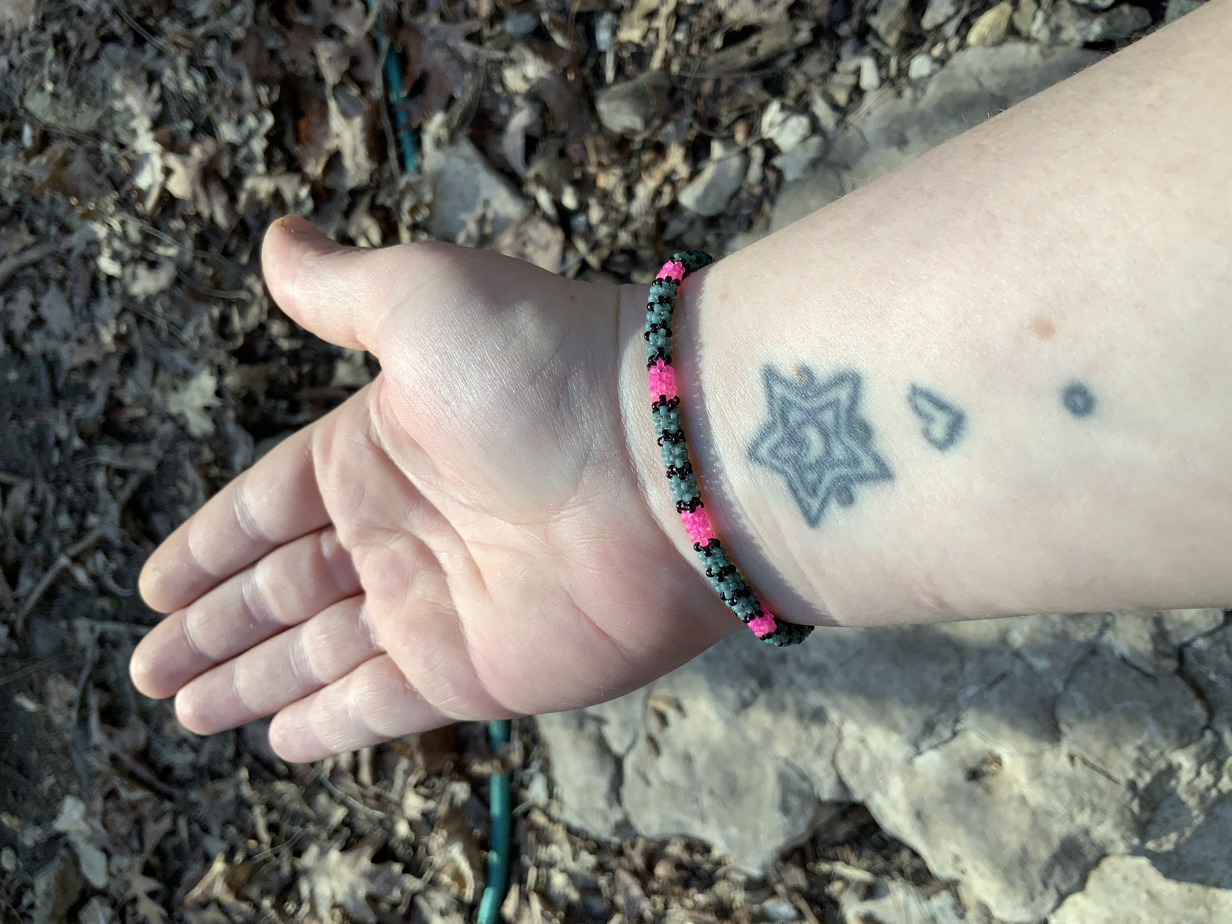 Sage and neon pink gourd stitched bracelet 