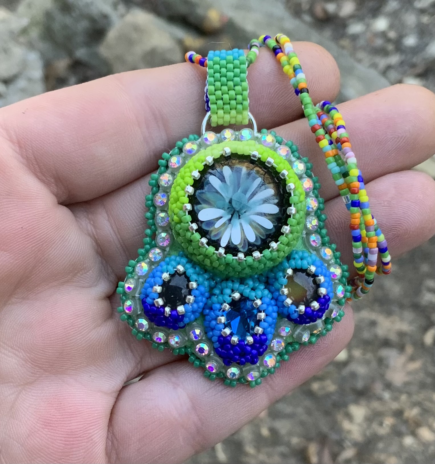 Valley pond beaded rocket ship pendant 
