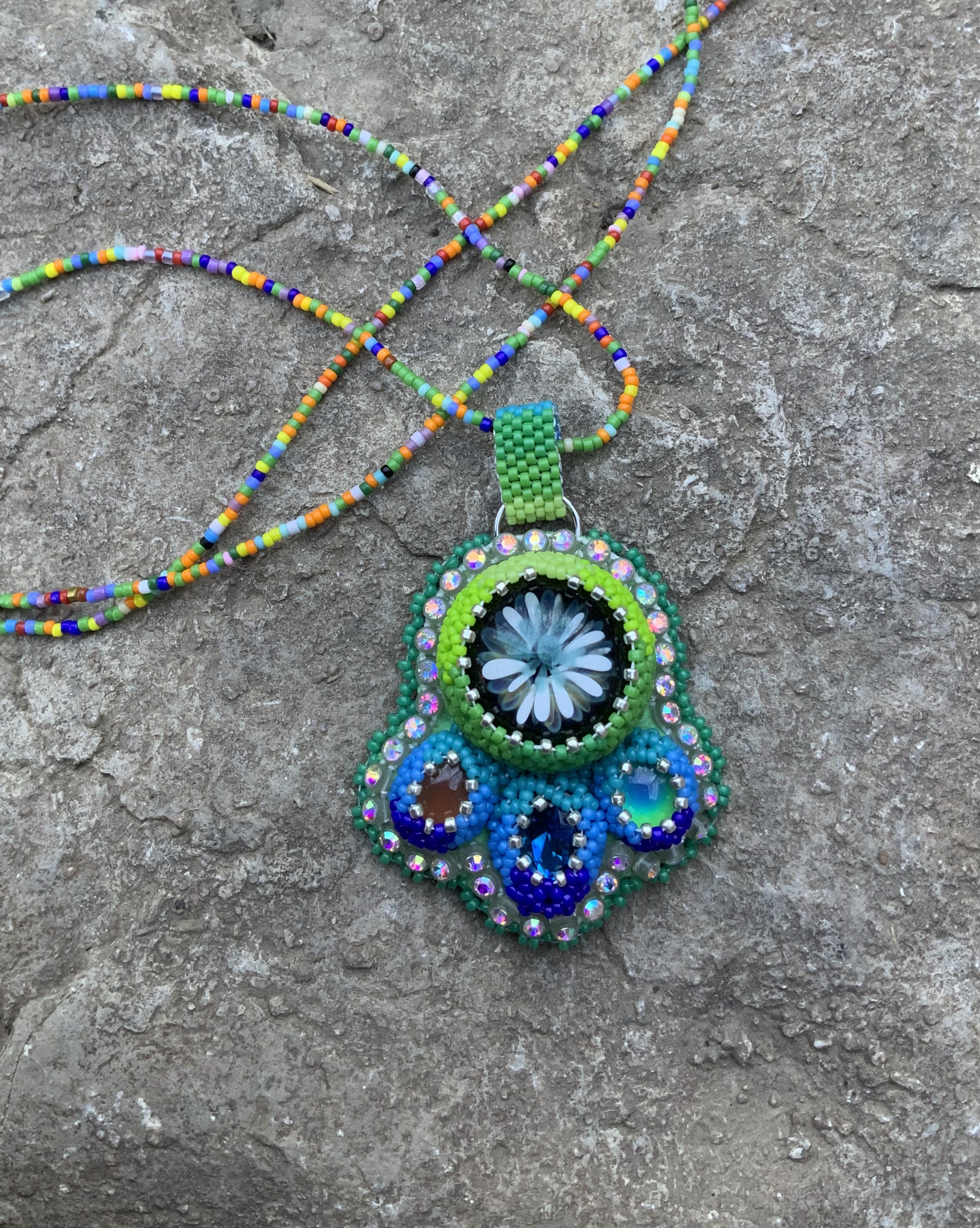 Valley pond beaded rocket ship pendant 