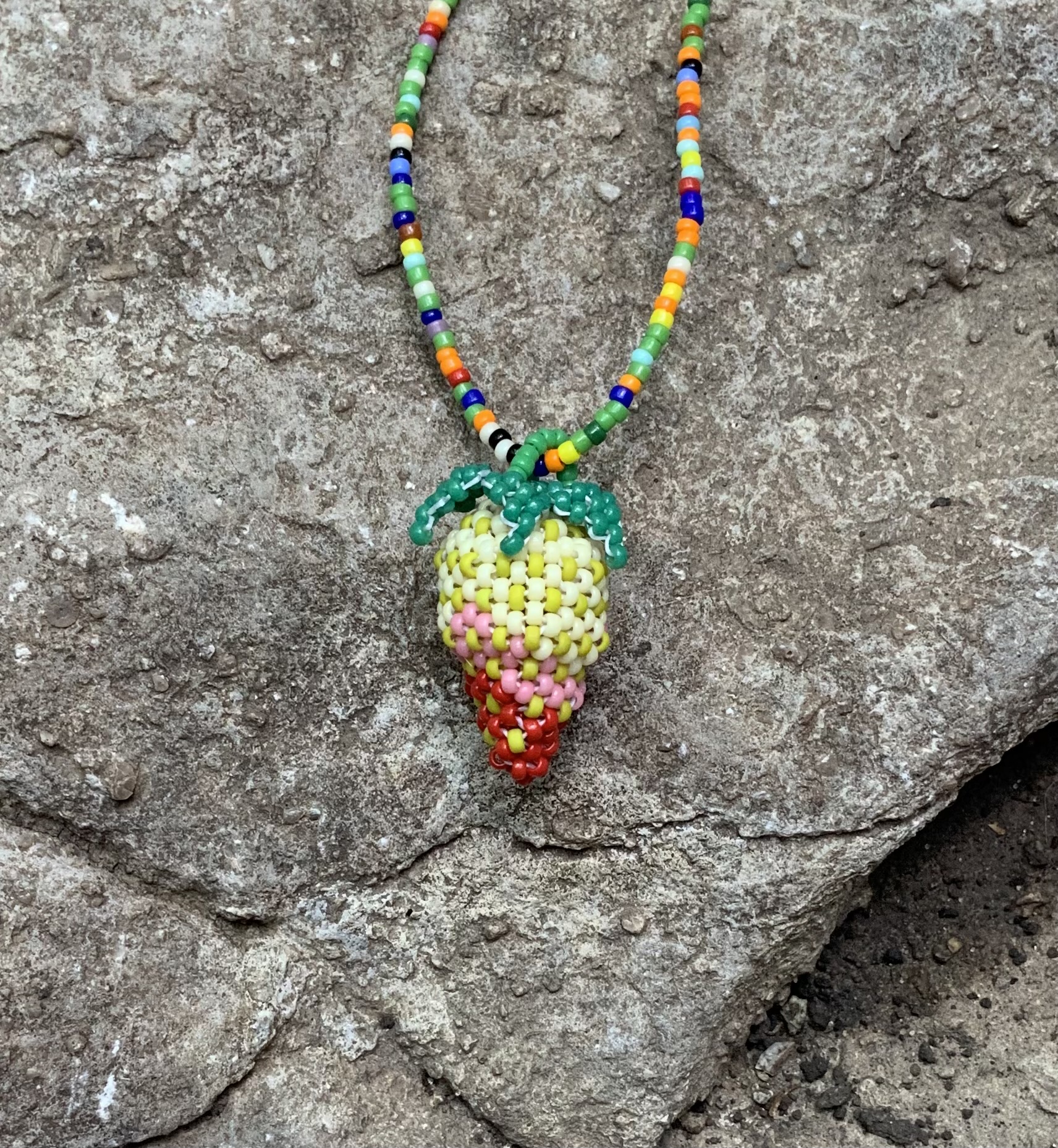 Half ripe beaded strawberry pendant