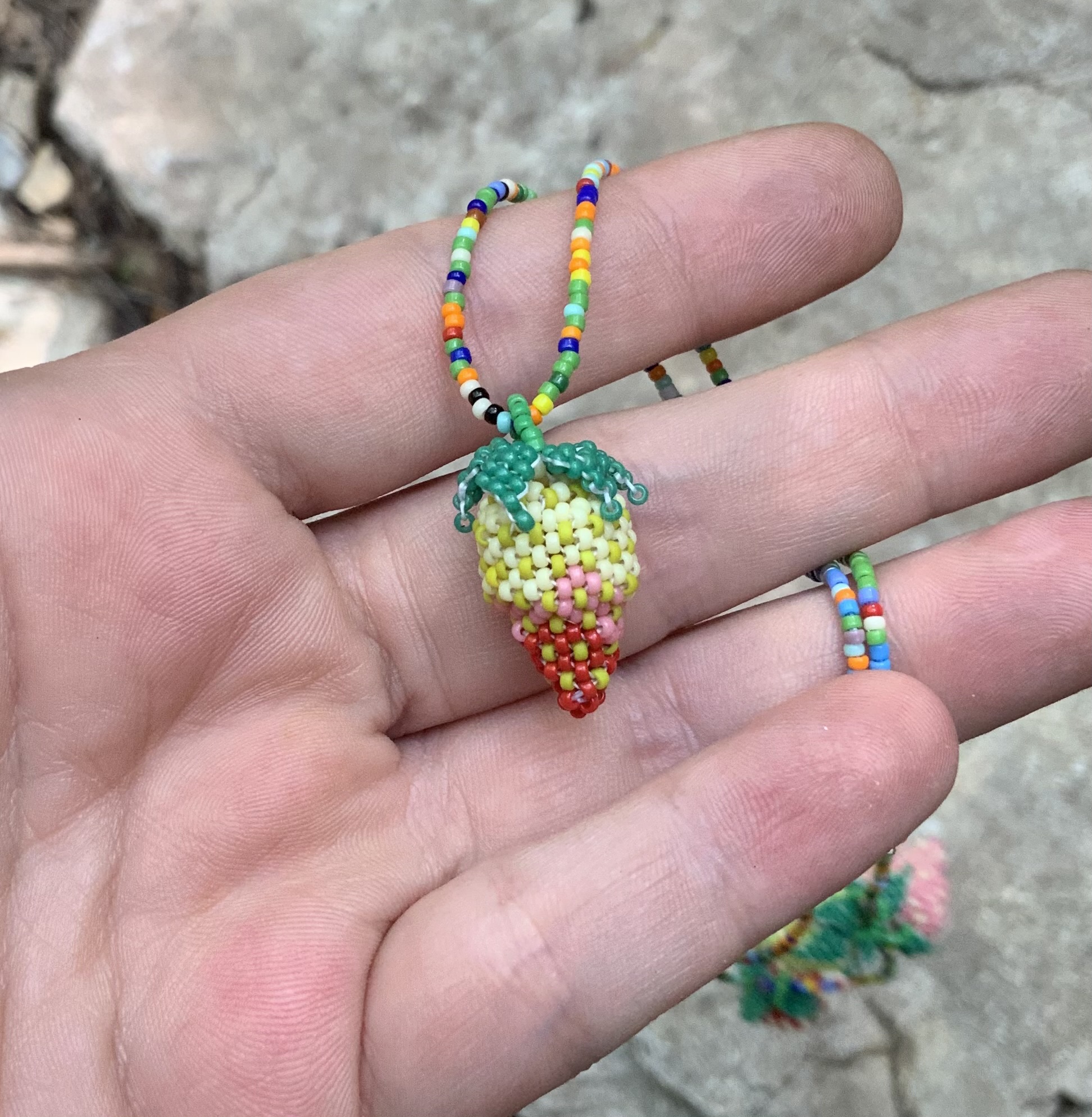 Half ripe beaded strawberry pendant