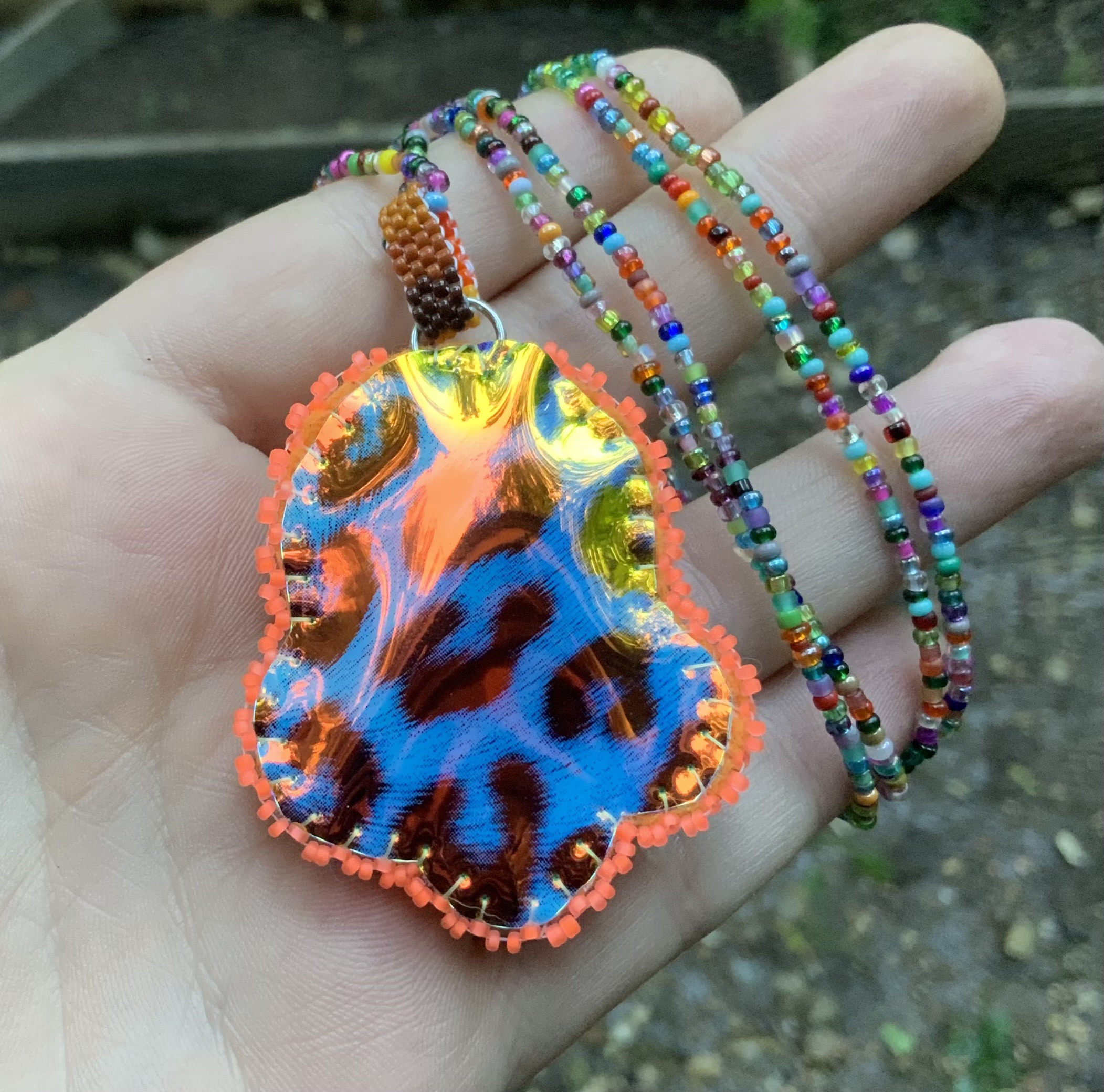 Custom rocket ship beaded amulet 
