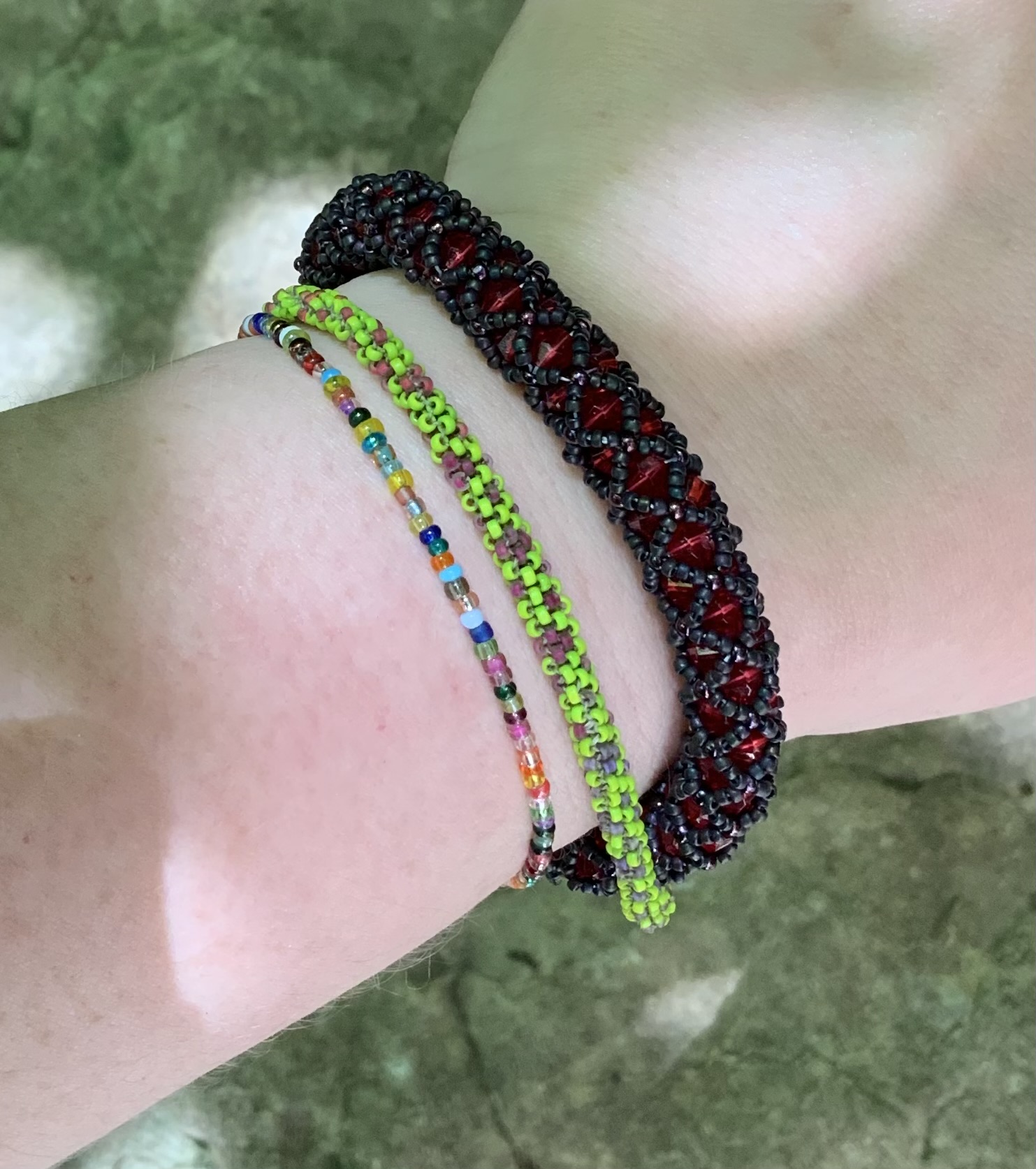 Black and blood red tubular netting beaded bracelet