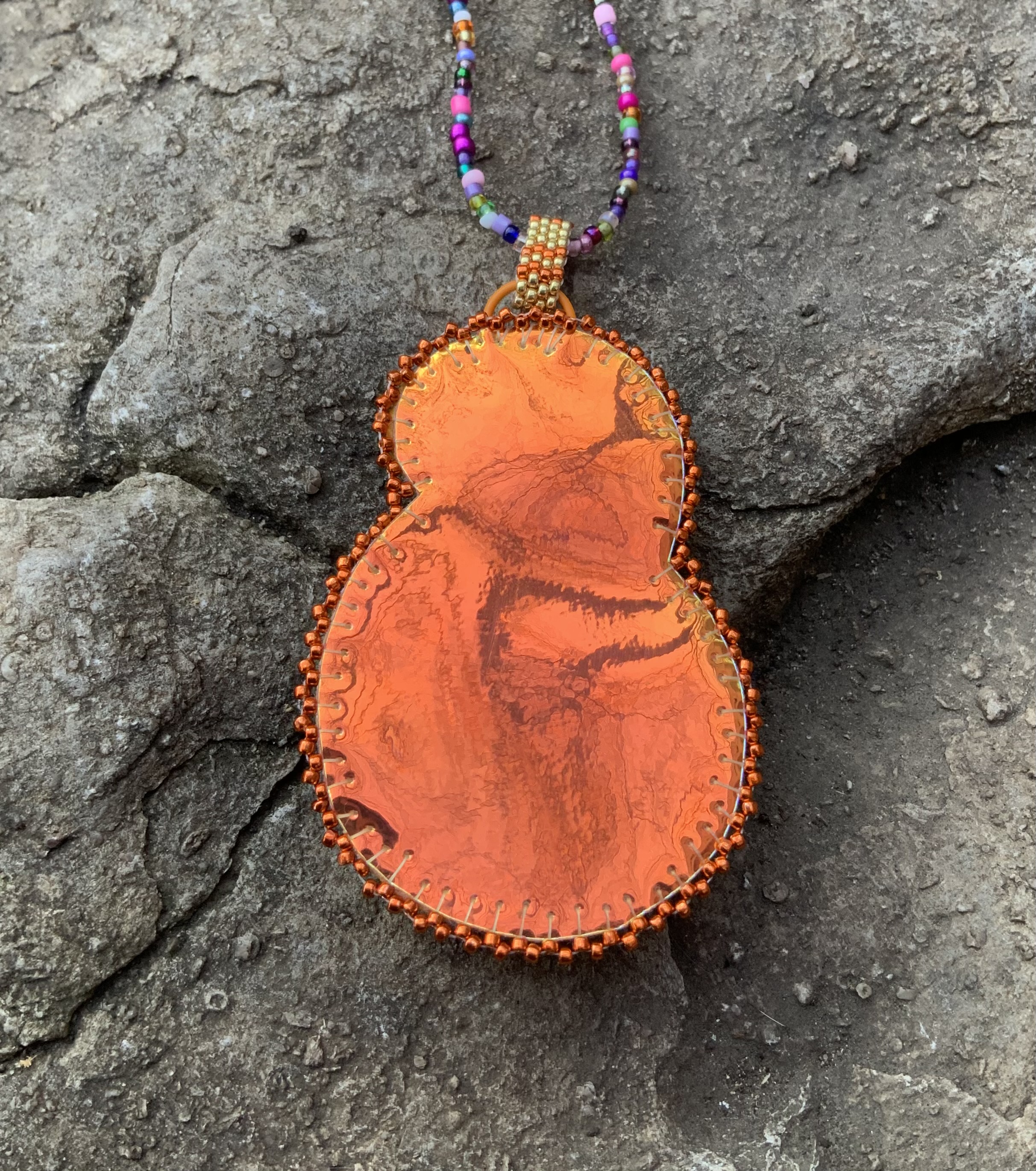 Fire swoop copper and gold bead embroidered pendant 