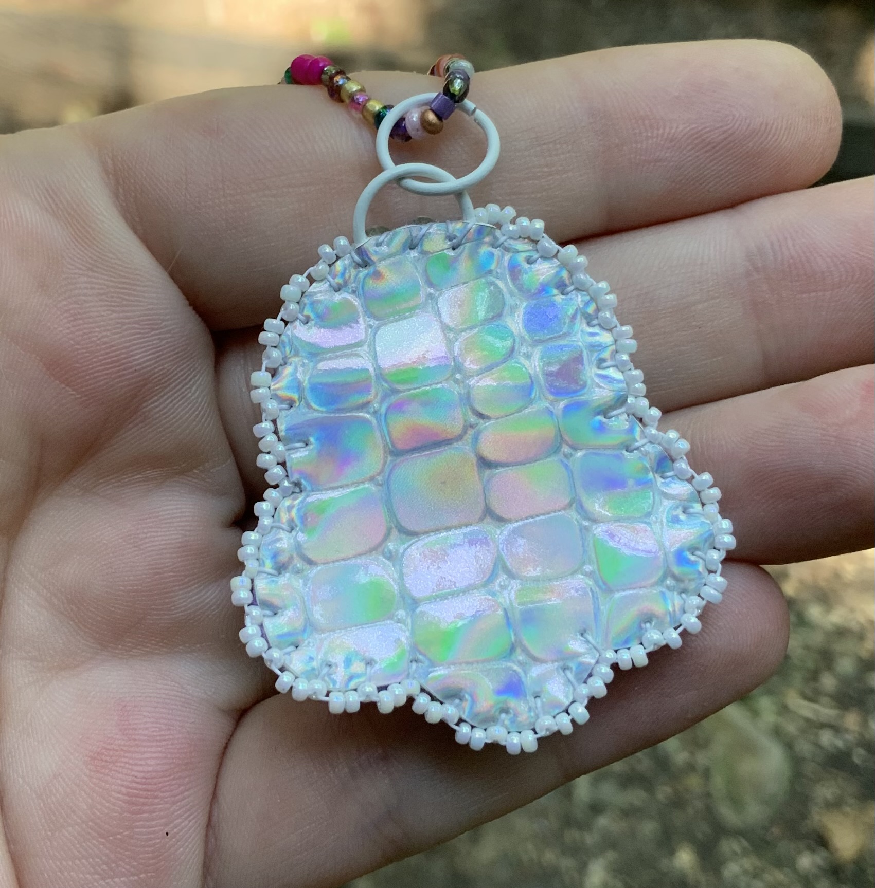 Intergalactic beam beaded pendant