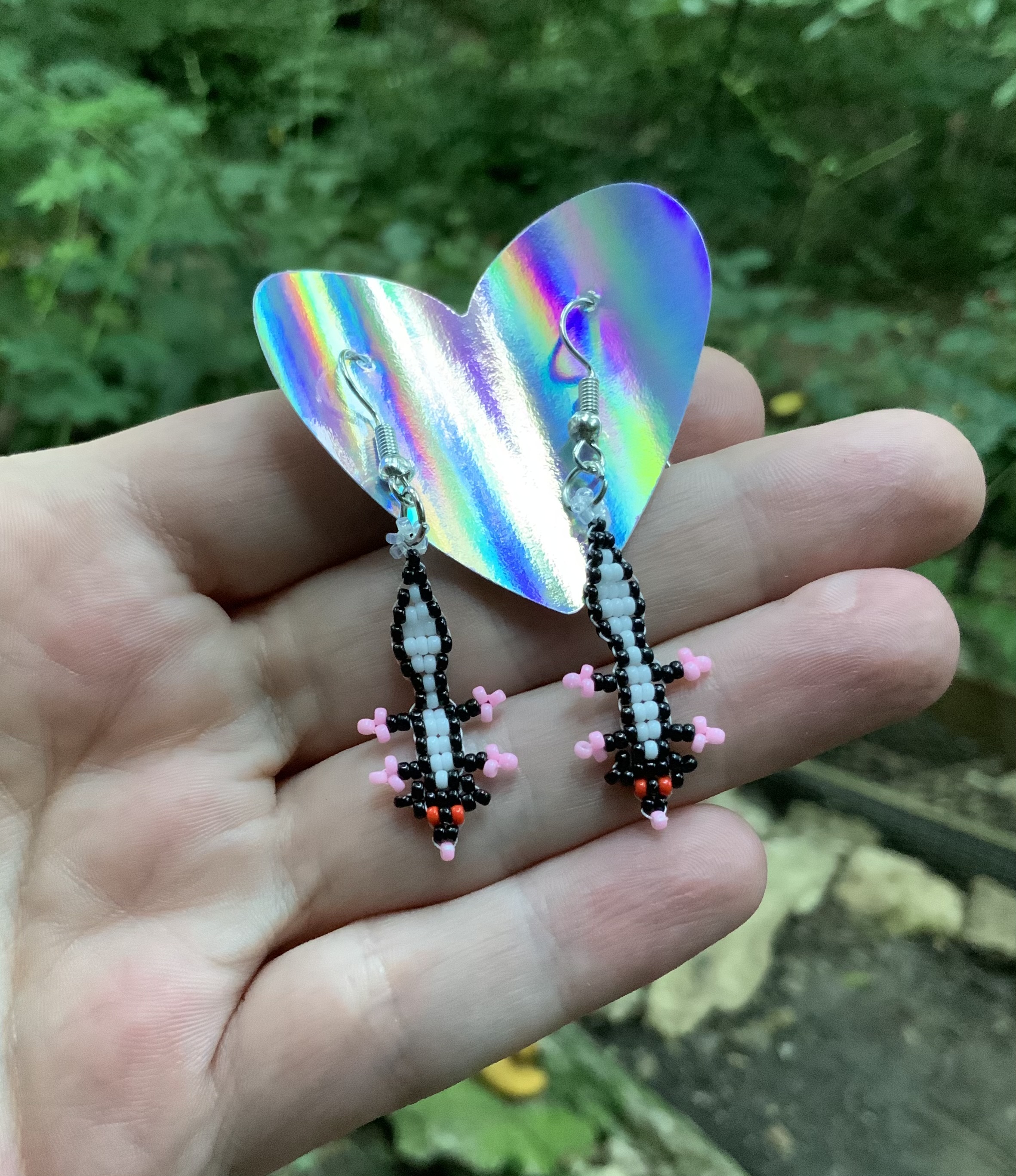Tiny beaded skunk earrings 