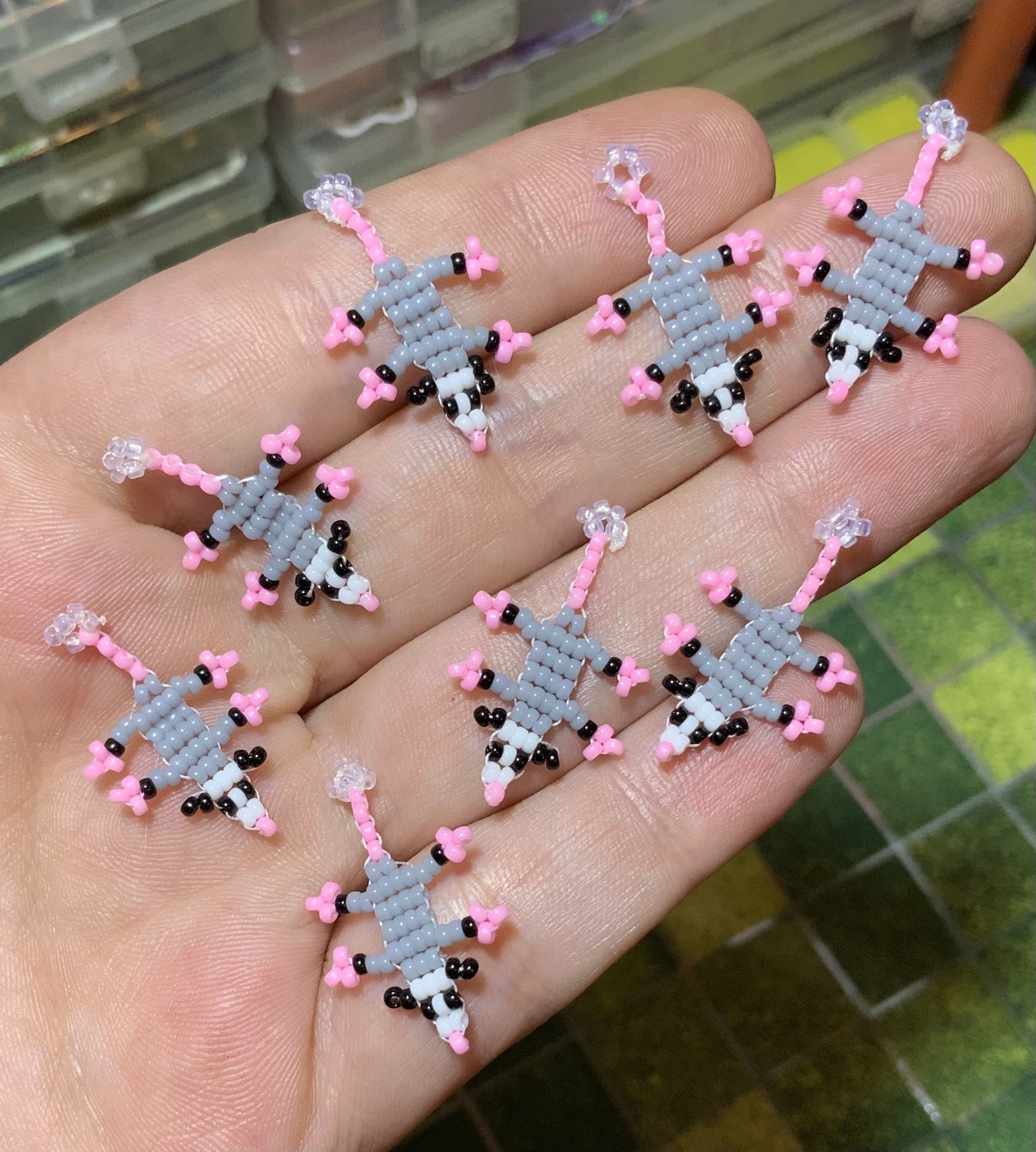 Tiny beaded opossum earrings