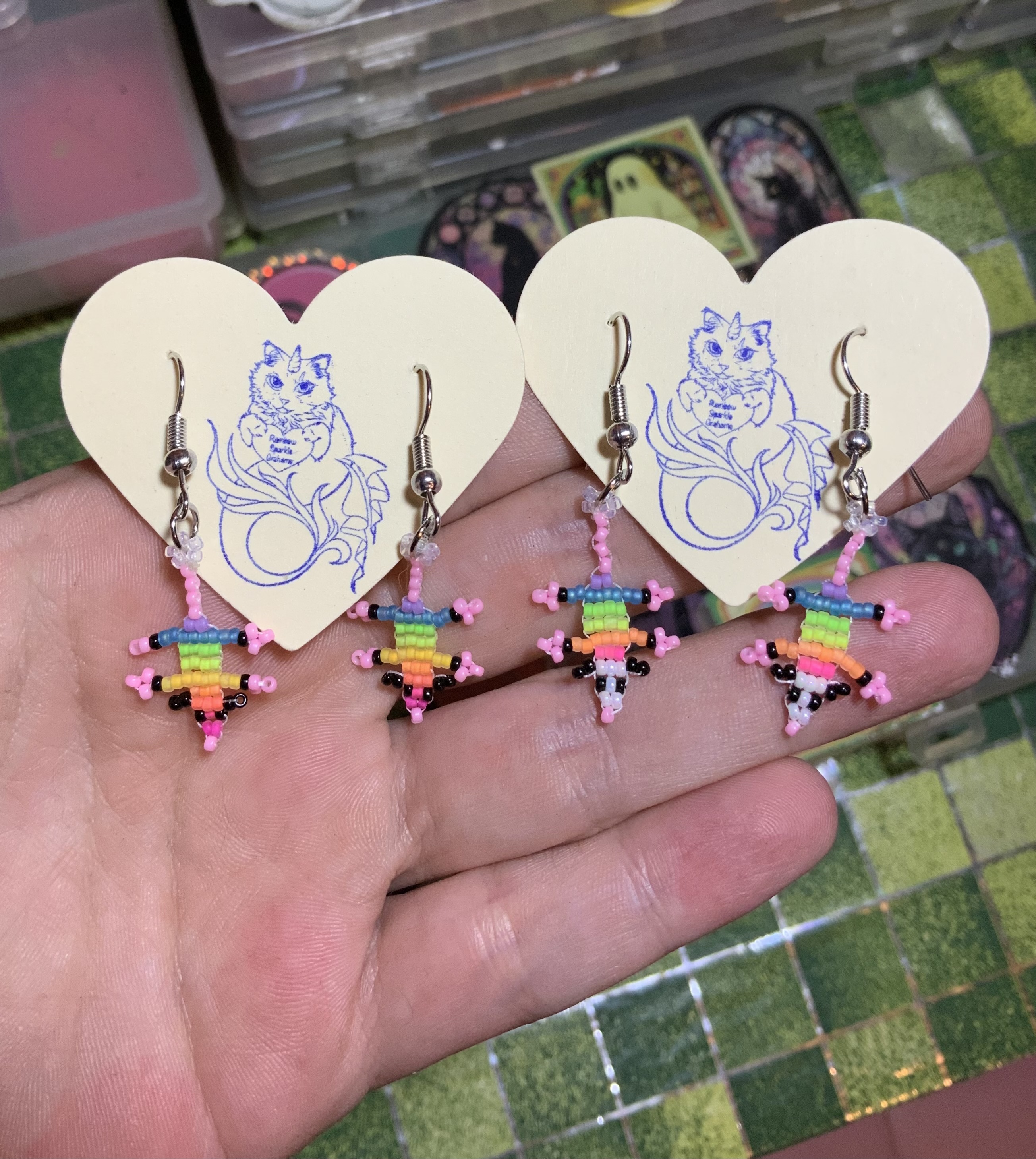 Rainbow beaded opossum earrings