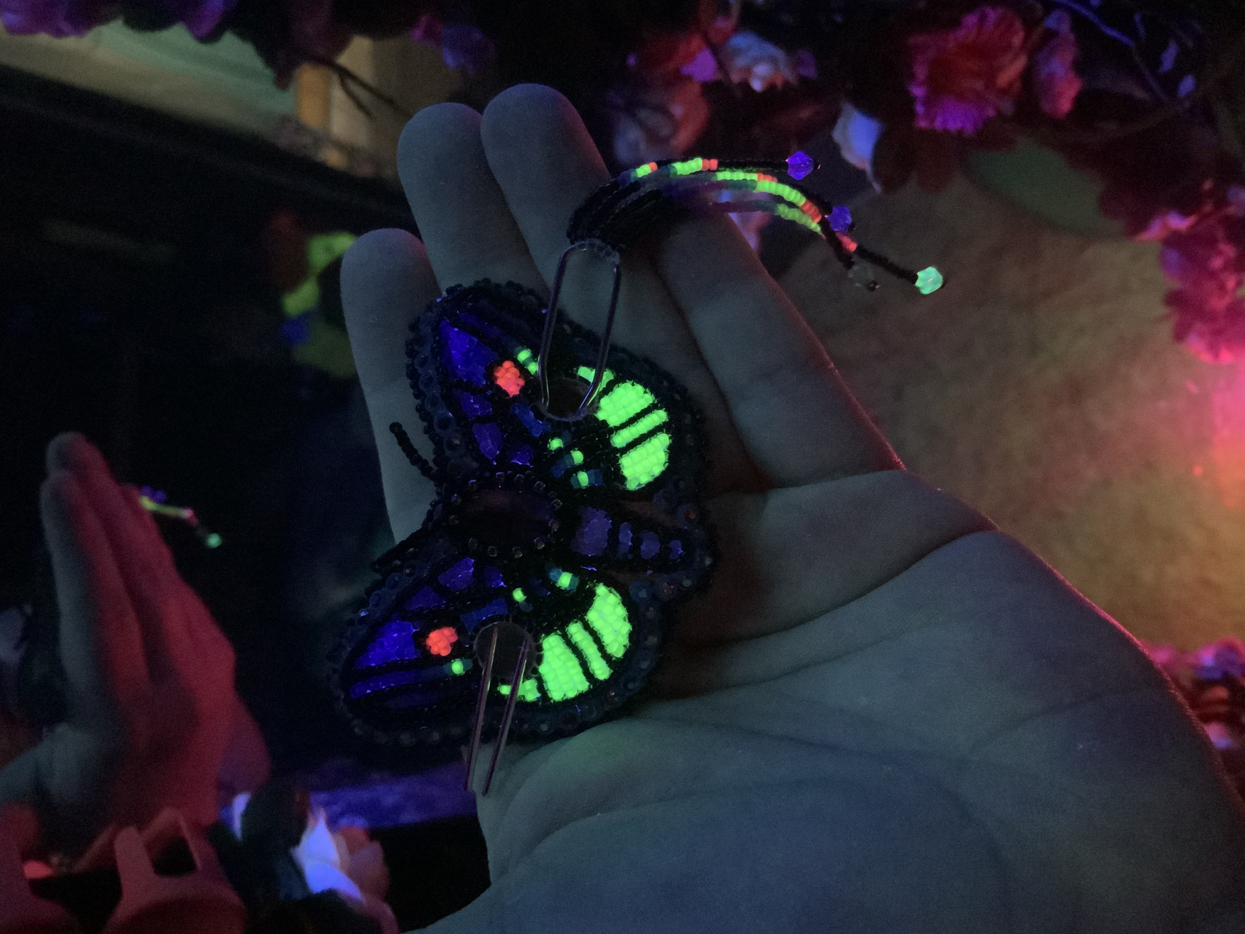 Blacklight reactive beaded moth barrette 