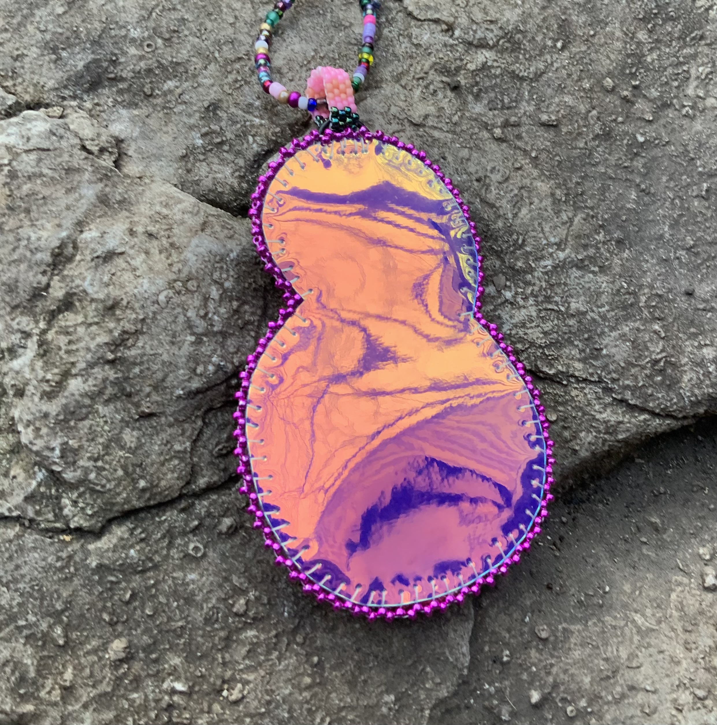 Purple swoop bead embroidered pendant