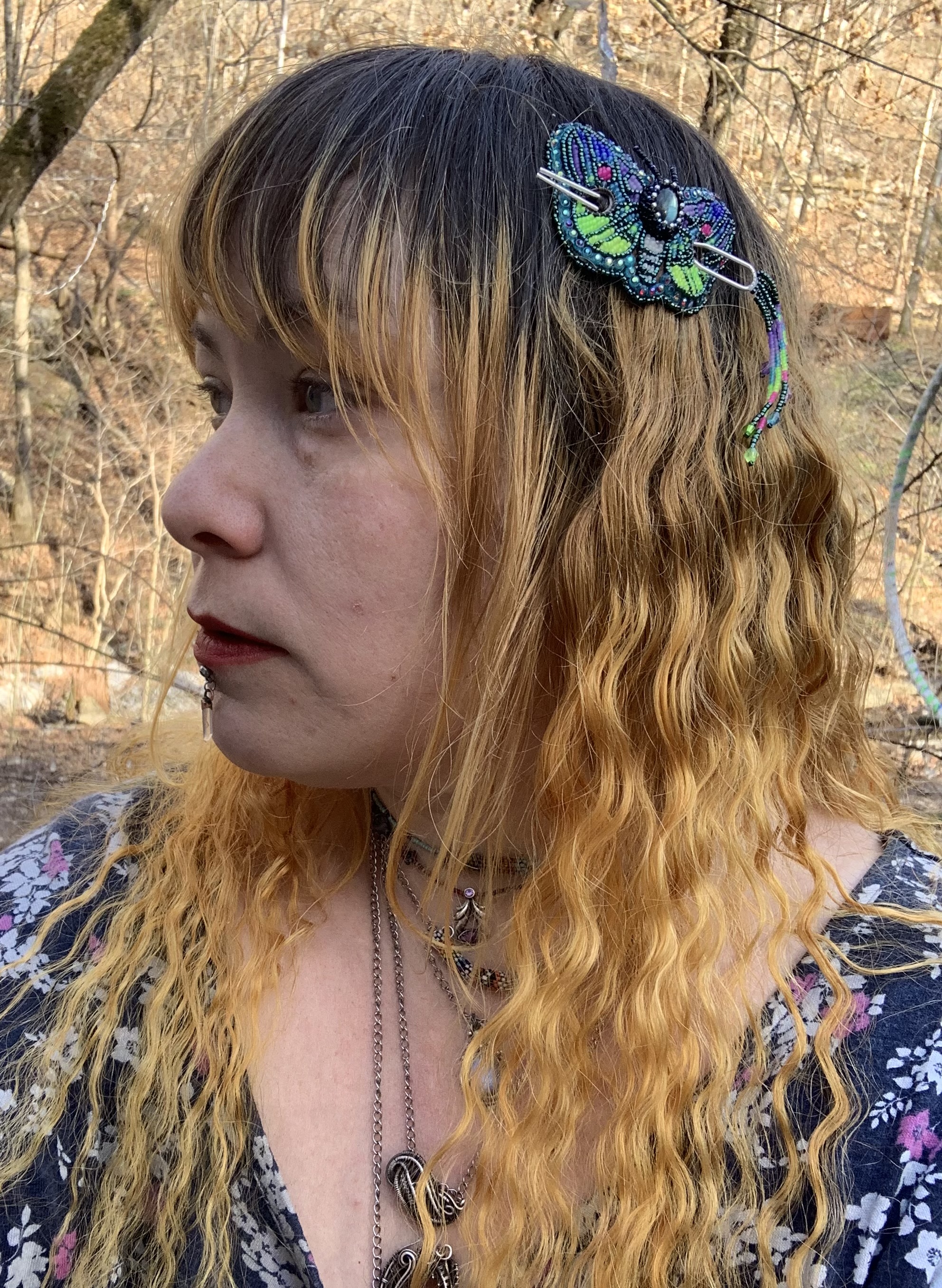 Blacklight reactive beaded moth barrette 