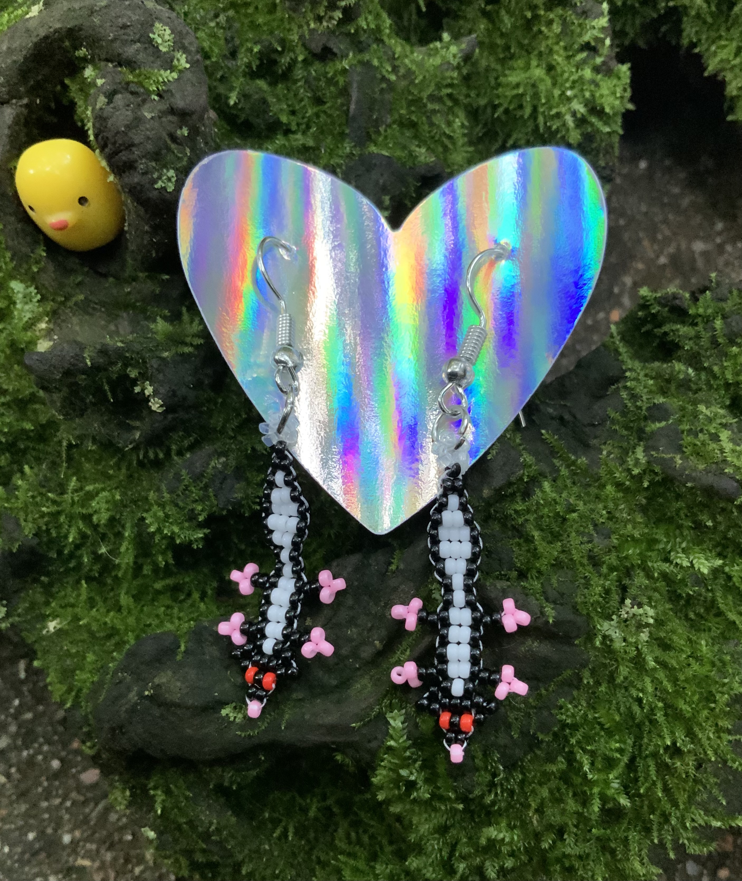 Tiny beaded skunk earrings 