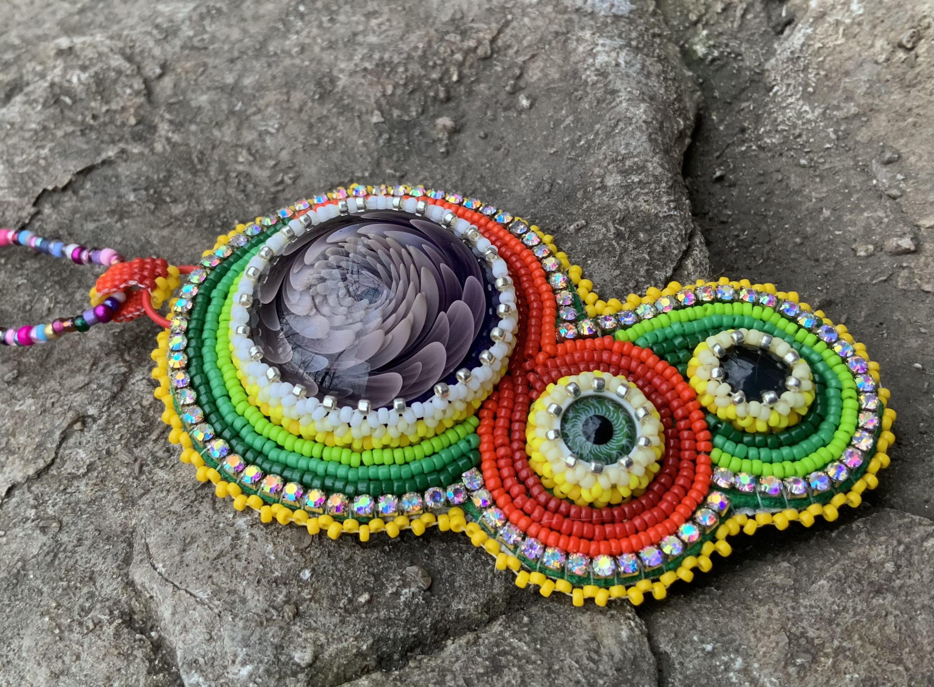 Santa’s eye bead embroidered pendant