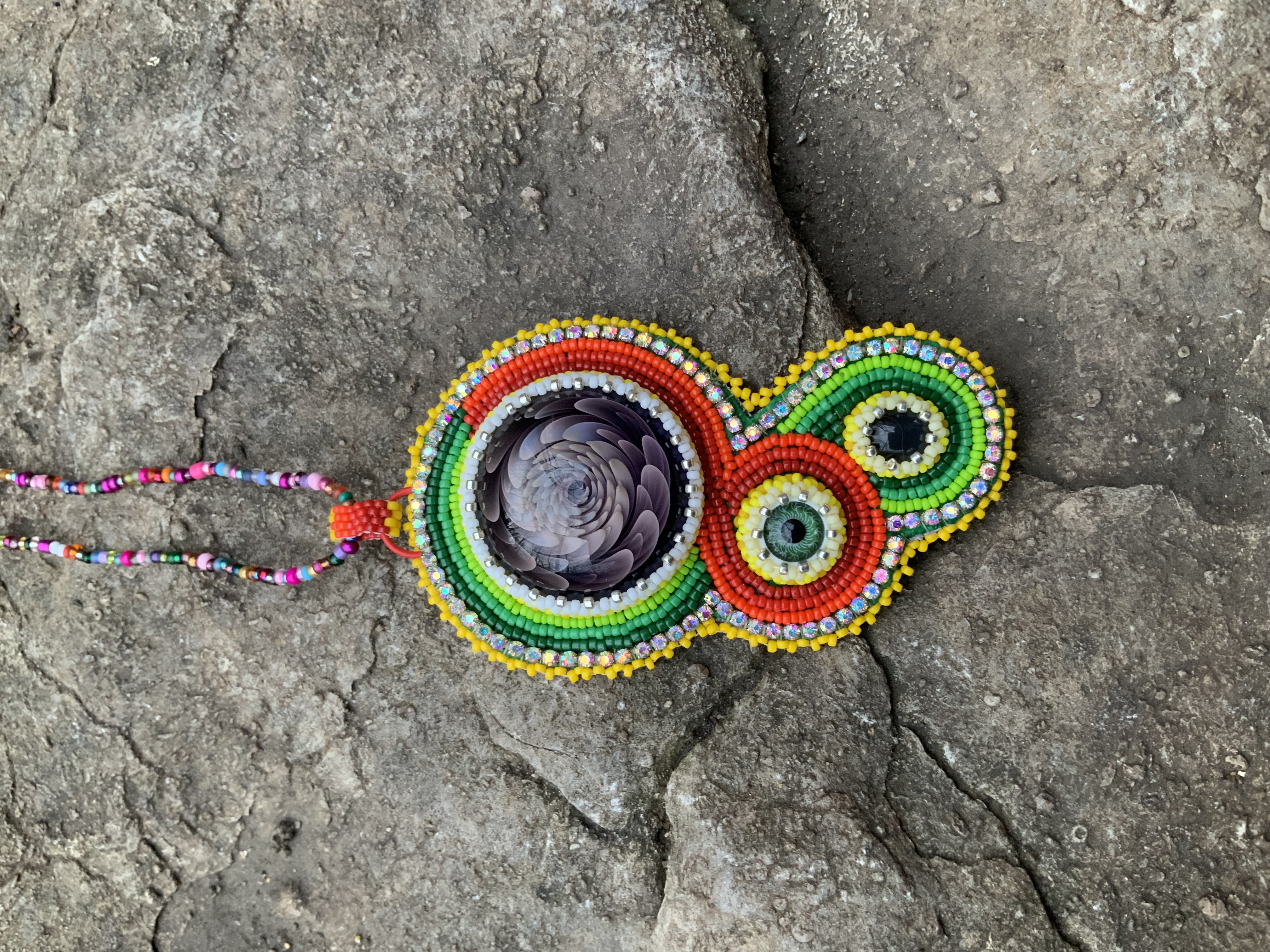 Santa’s eye bead embroidered pendant