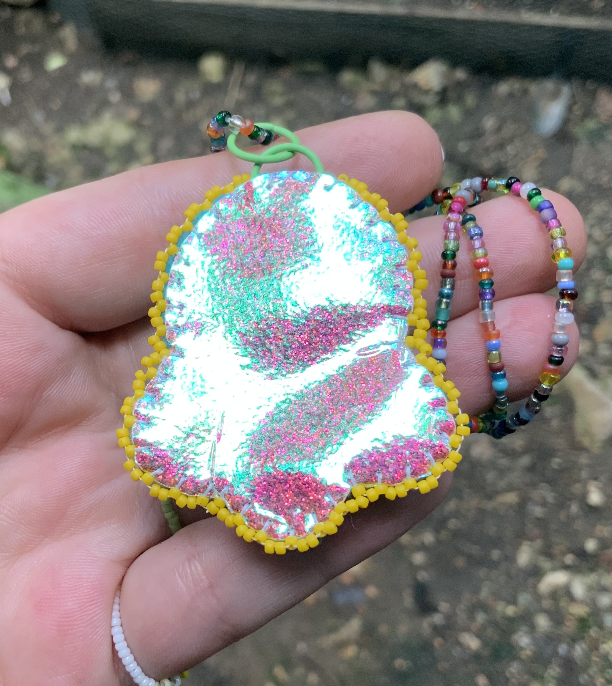 Pink fire beaded pendant